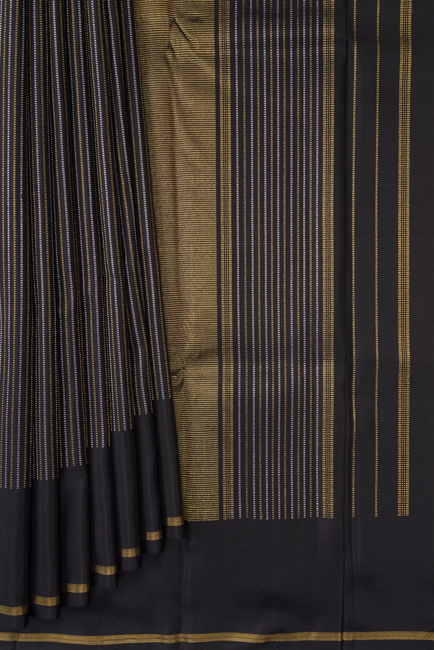 Pleats and pallu of Pure Silk Pure Zari Black Dual Tone Kanchipuram Saree with Stripes on the body and Zari Border. 