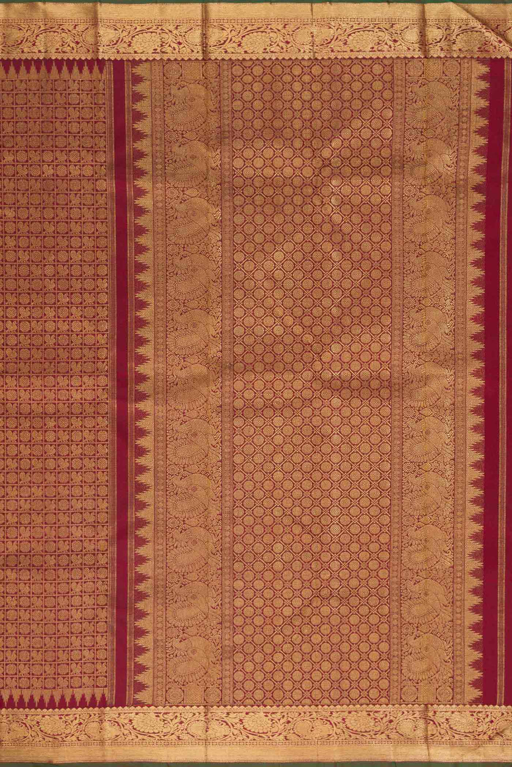 Close up image of the pallu of Maroon Dual Tone Kanchipuram Silk Saree with Zari Brocade on the body and Zari Border