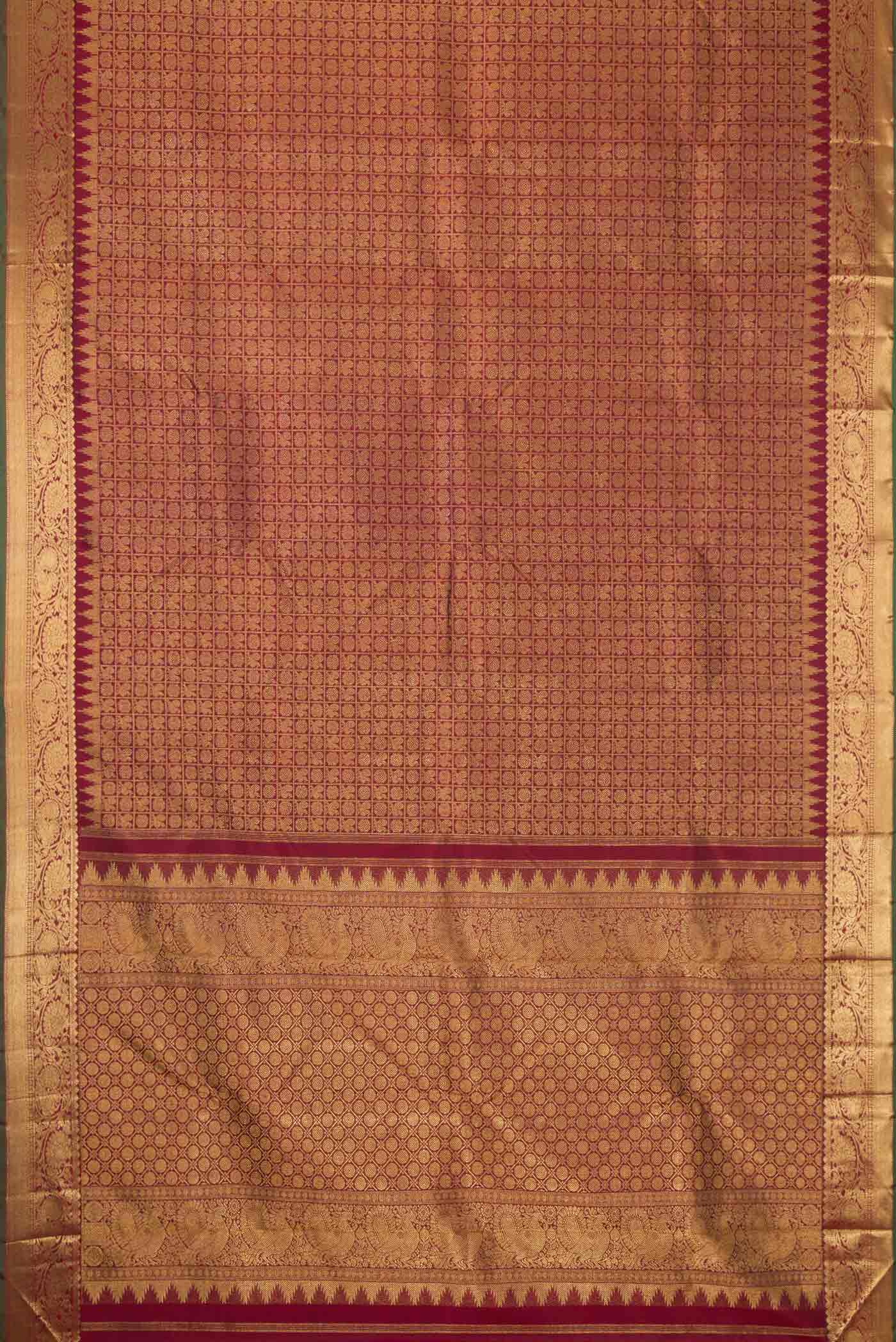 Flat view of Maroon Dual Tone Kanchipuram Silk Saree with Zari Brocade on the body and Zari Border