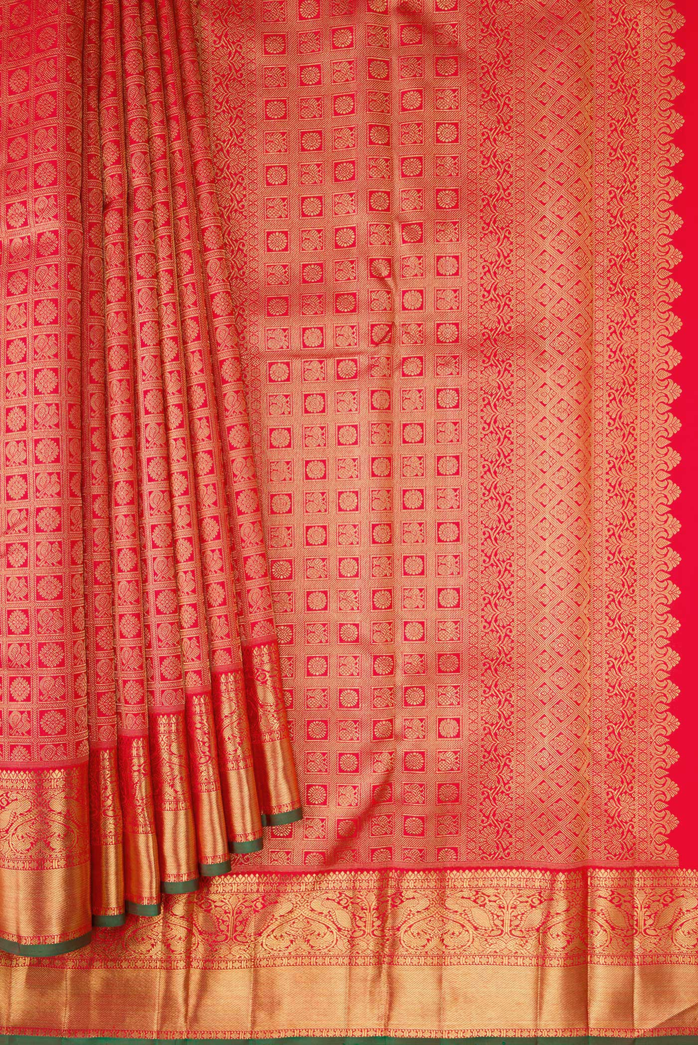 Pleats and pallu of Pure Silk Pure Zari Red Dual Tone Kanjivaram Saree with Zari Brocade on the body and Zari Border. 