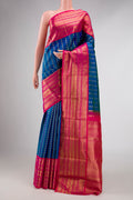 Pure Silk Pure Zari Peacock Blue Dual Tone Kanchipuram Saree with Zari Butta on the body and Zari Border displayed on a mannequin