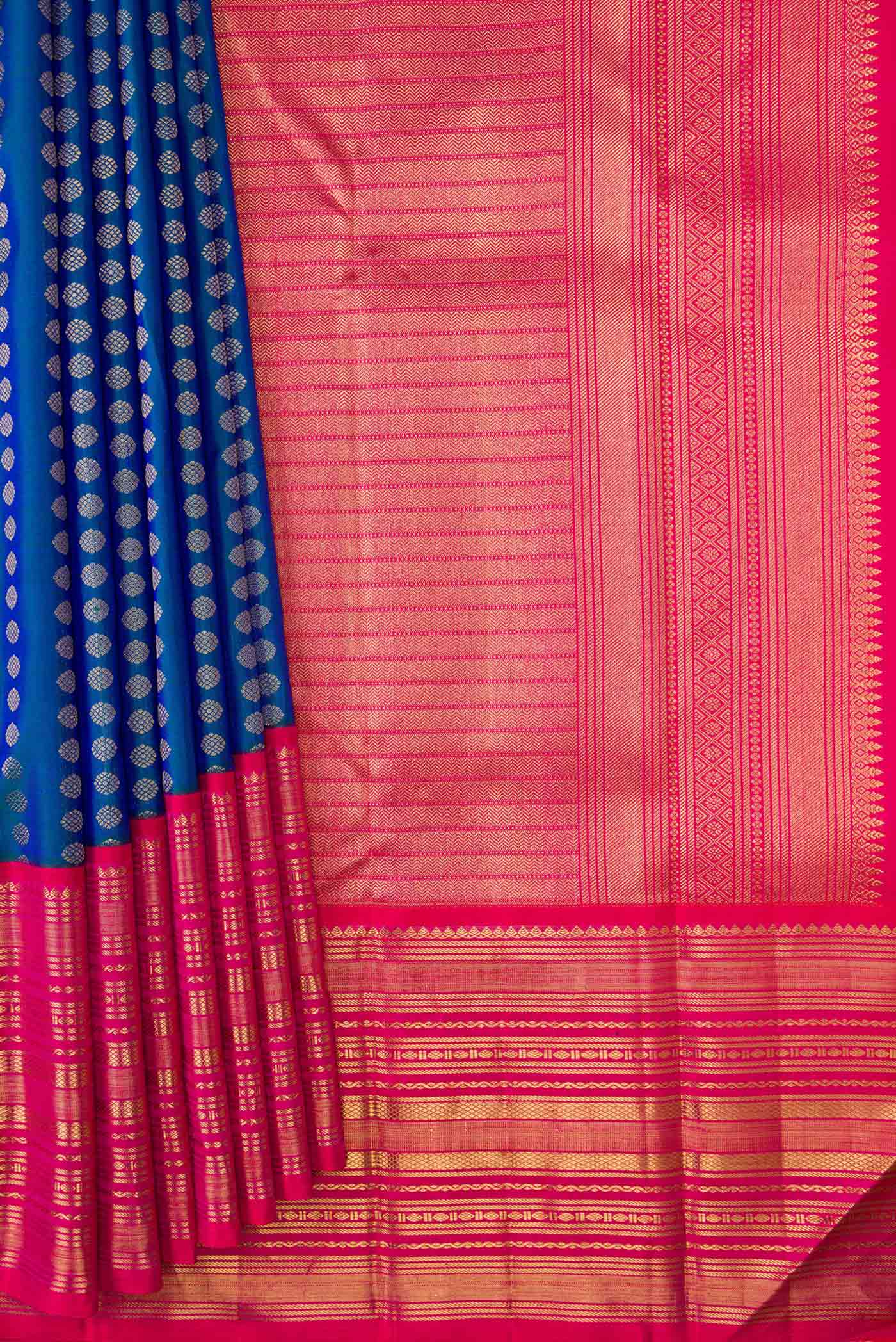 Pleats and pallu of Pure Silk Pure Zari Peacock Blue Dual Tone Kanchipuram Saree with Zari Butta on the body and Zari Border
