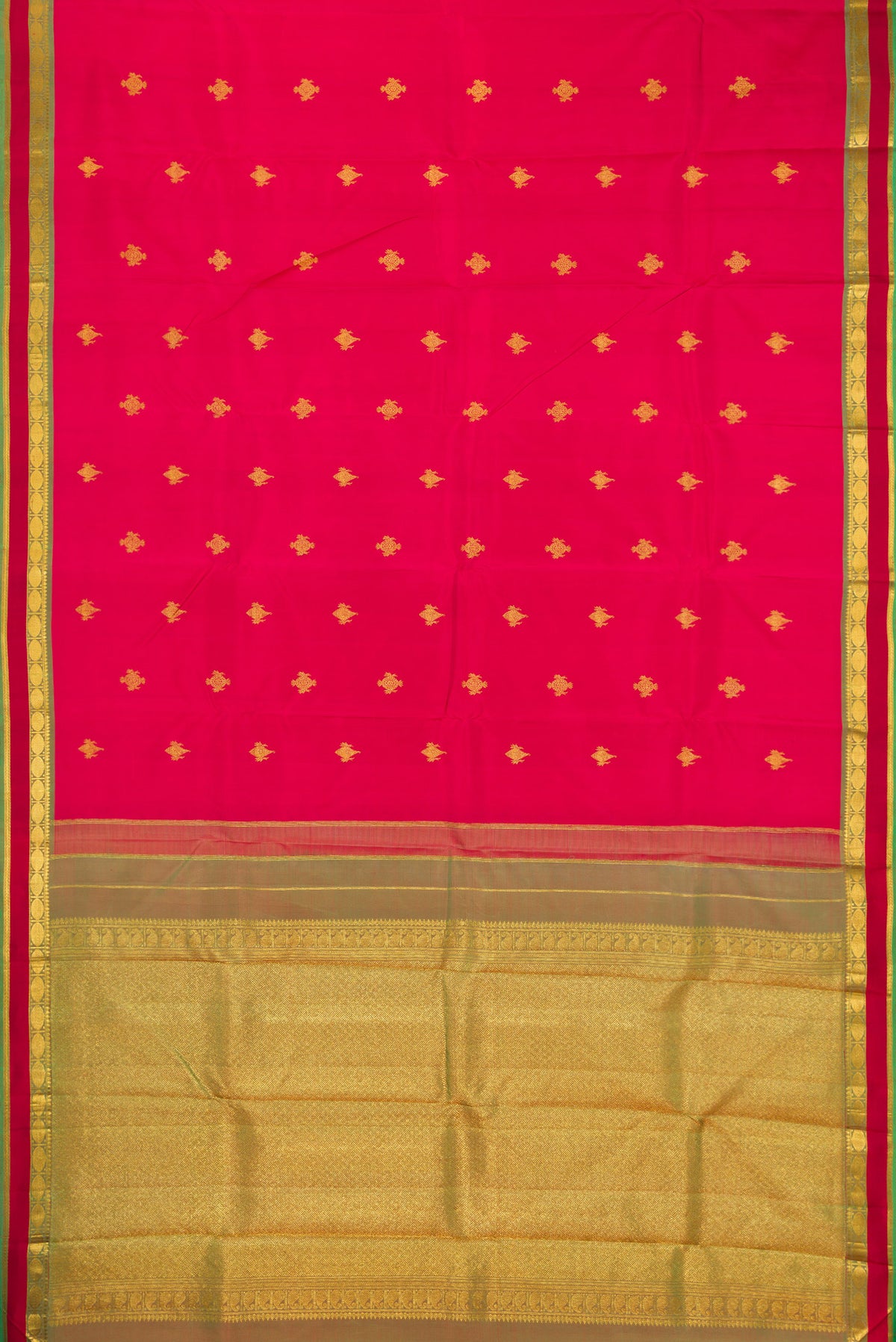 Flat view of Deep Red Kanchipuram Silk Saree with Zari Butta on the body and Zari Border. 