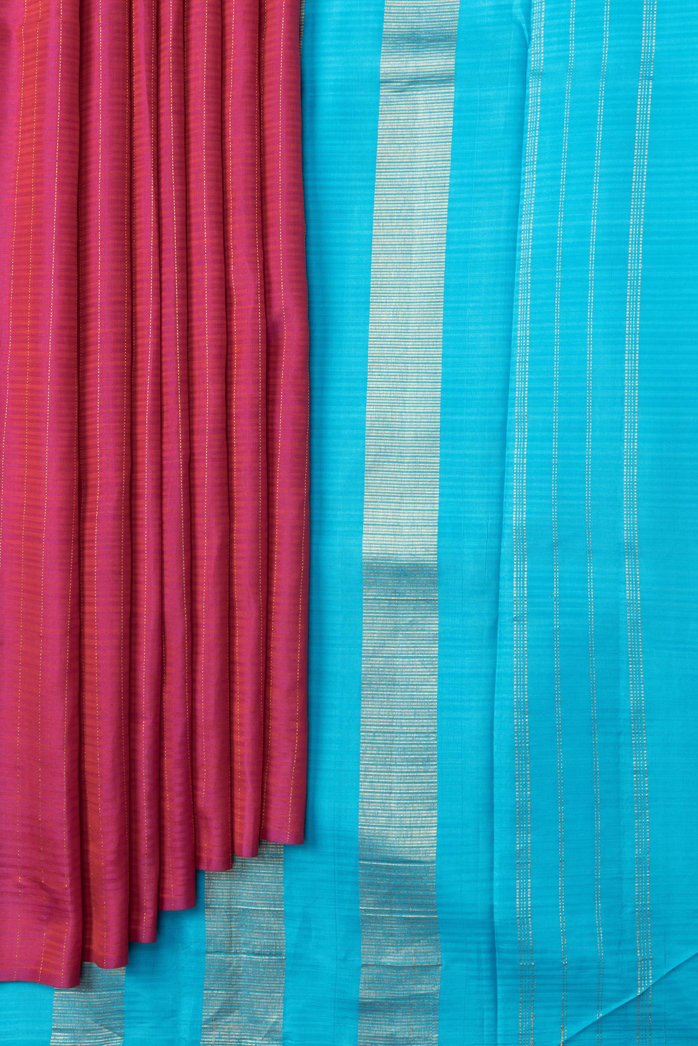 Pleats and pallu of Pink Dual Tone Kanjivaram Silk Saree with Stripes on the body and Without Border. 