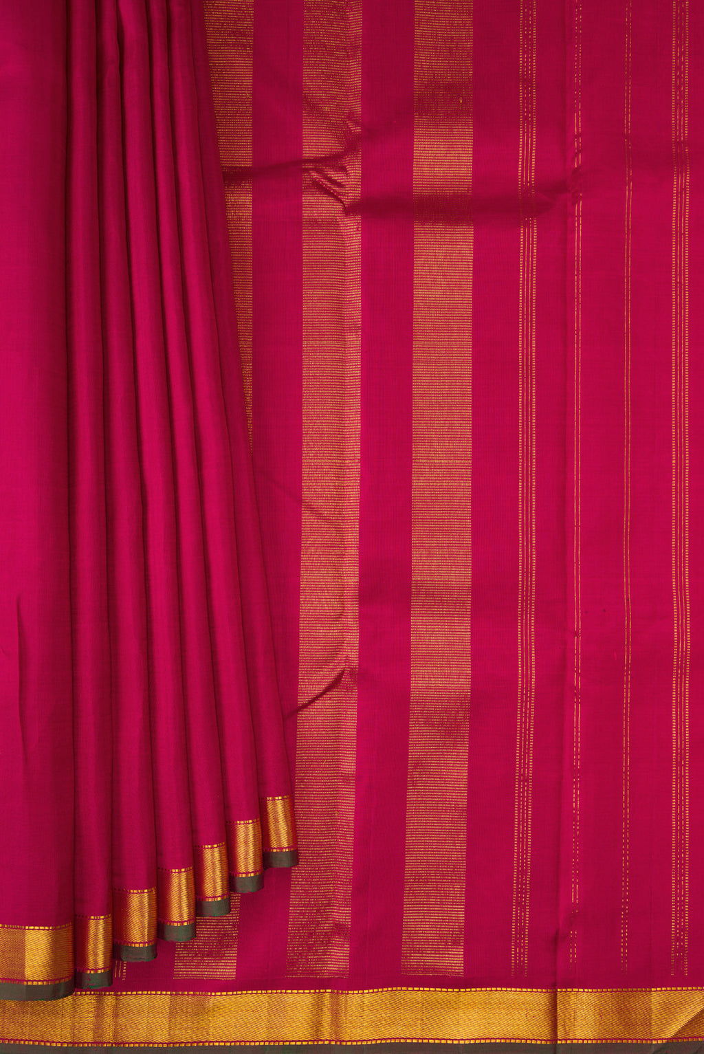 Pleats and pallu of Maroon Kanjivaram Silk Saree with Plain Body and Zari Border. 