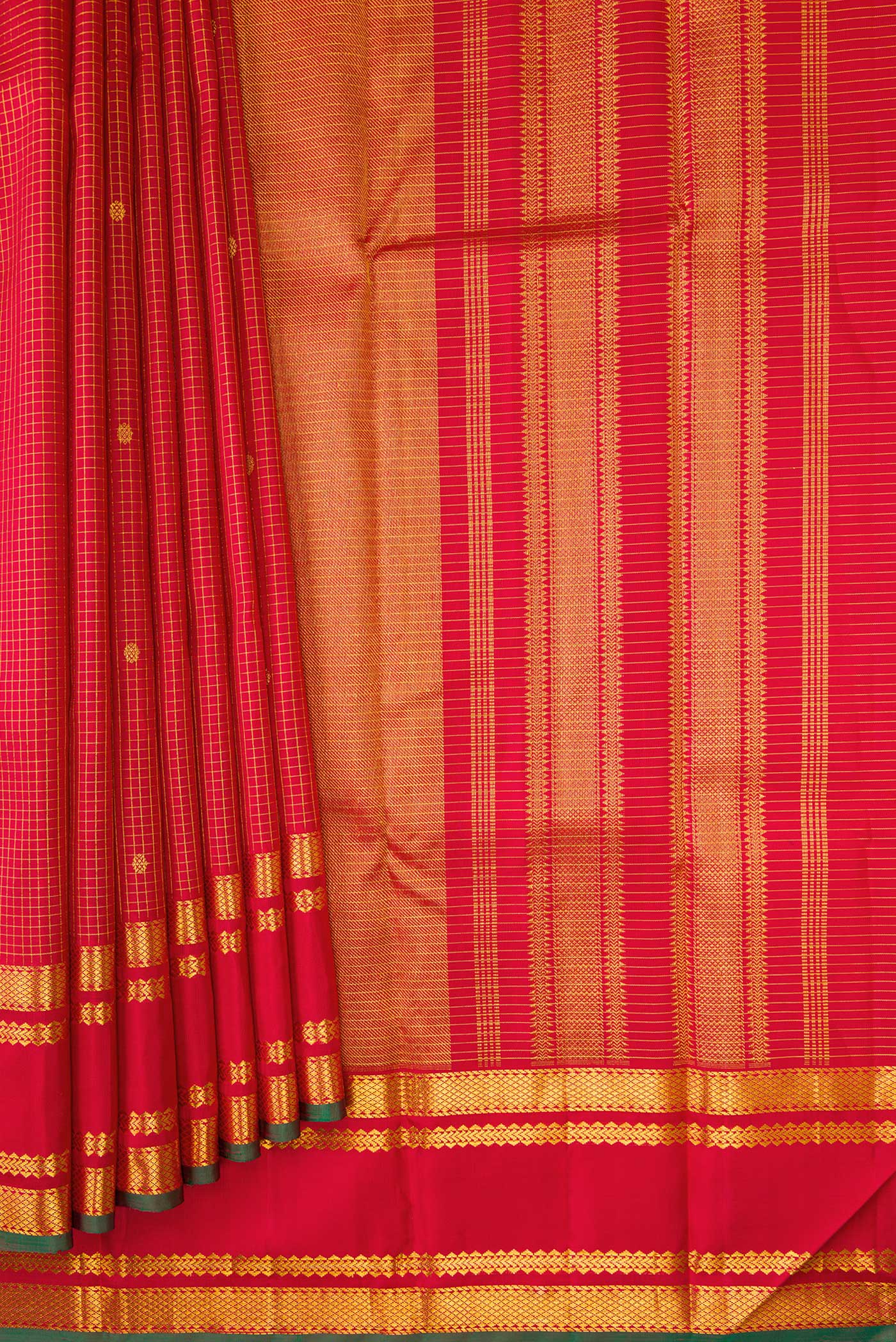 Pleats and pallu of Deep Red Dual Tone Kanjivaram Silk Saree with Checked design on the body and Zari Border. 
