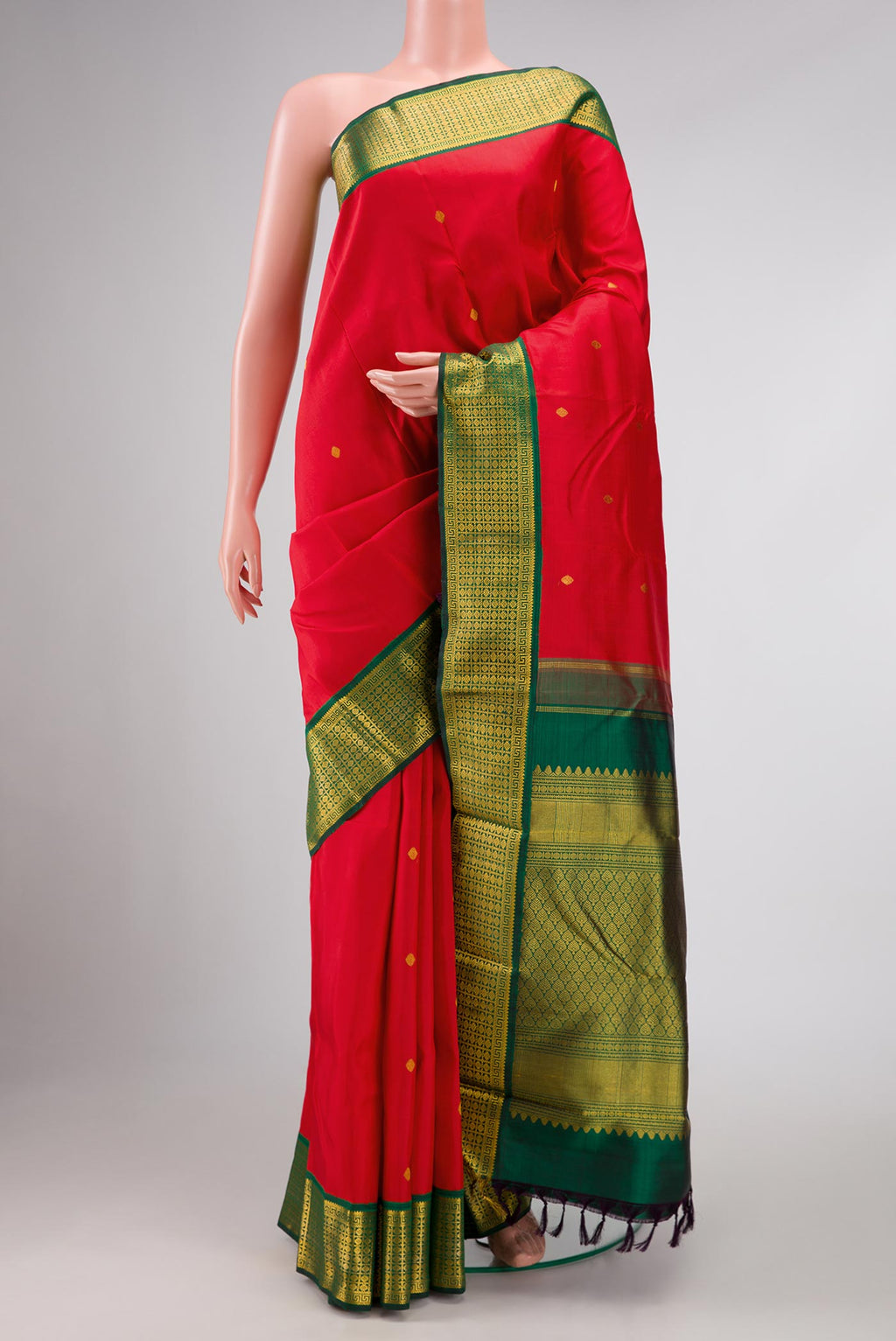 Red Dual Tone Kanchipuram Silk Saree with Zari Butta on the body and Zari Border displayed on a mannequin