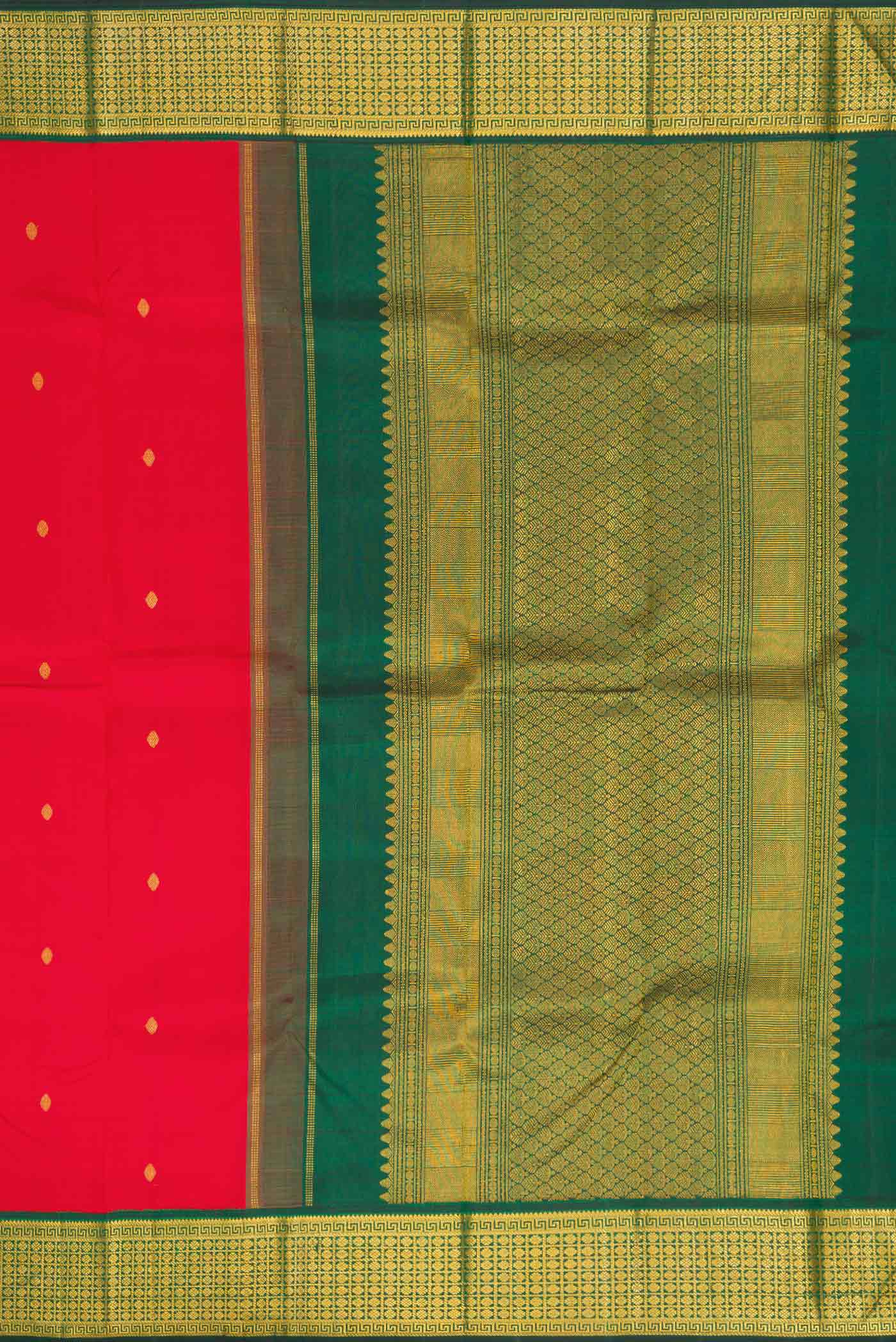 Close up image of the pallu of Red Dual Tone Kanchipuram Silk Saree with Zari Butta on the body and Zari Border