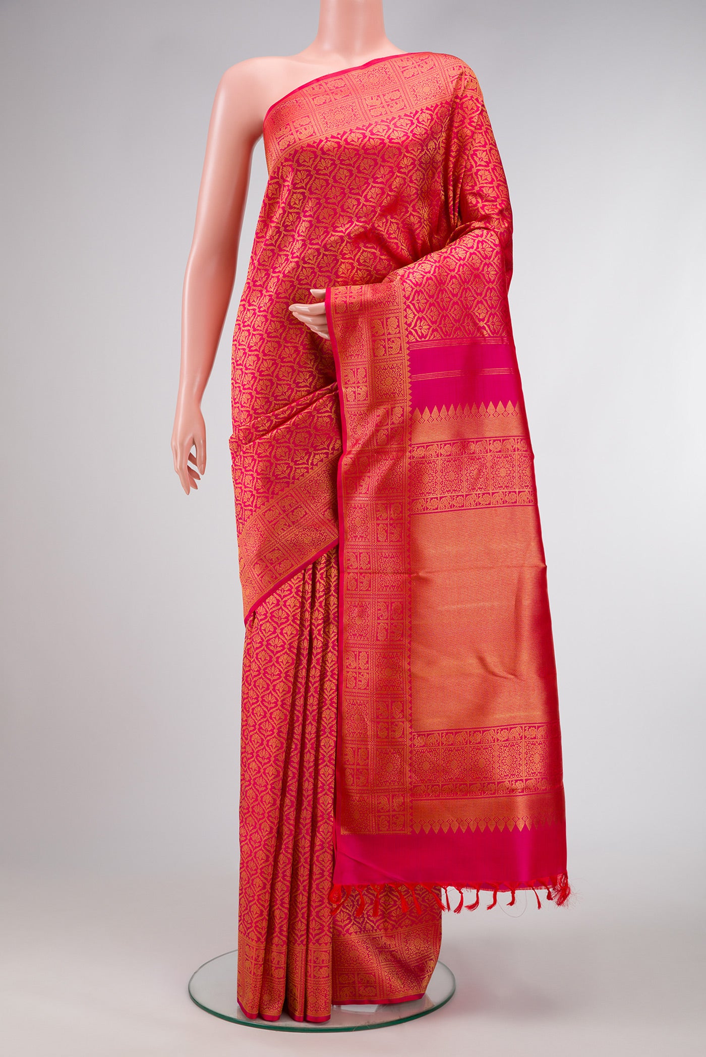 Pink Dual Tone Kanchipuram Silk Saree with Zari Brocade on the body and Zari Border.  displayed on a mannequin