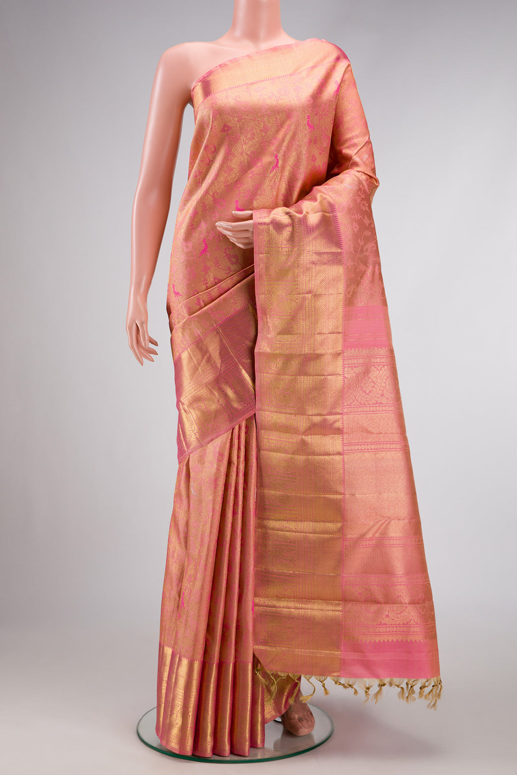 Pure Silk Pure Zari Pink Dual Tone Kanjivaram Saree with Zari Brocade on the body and Zari Border.  displayed on a mannequin