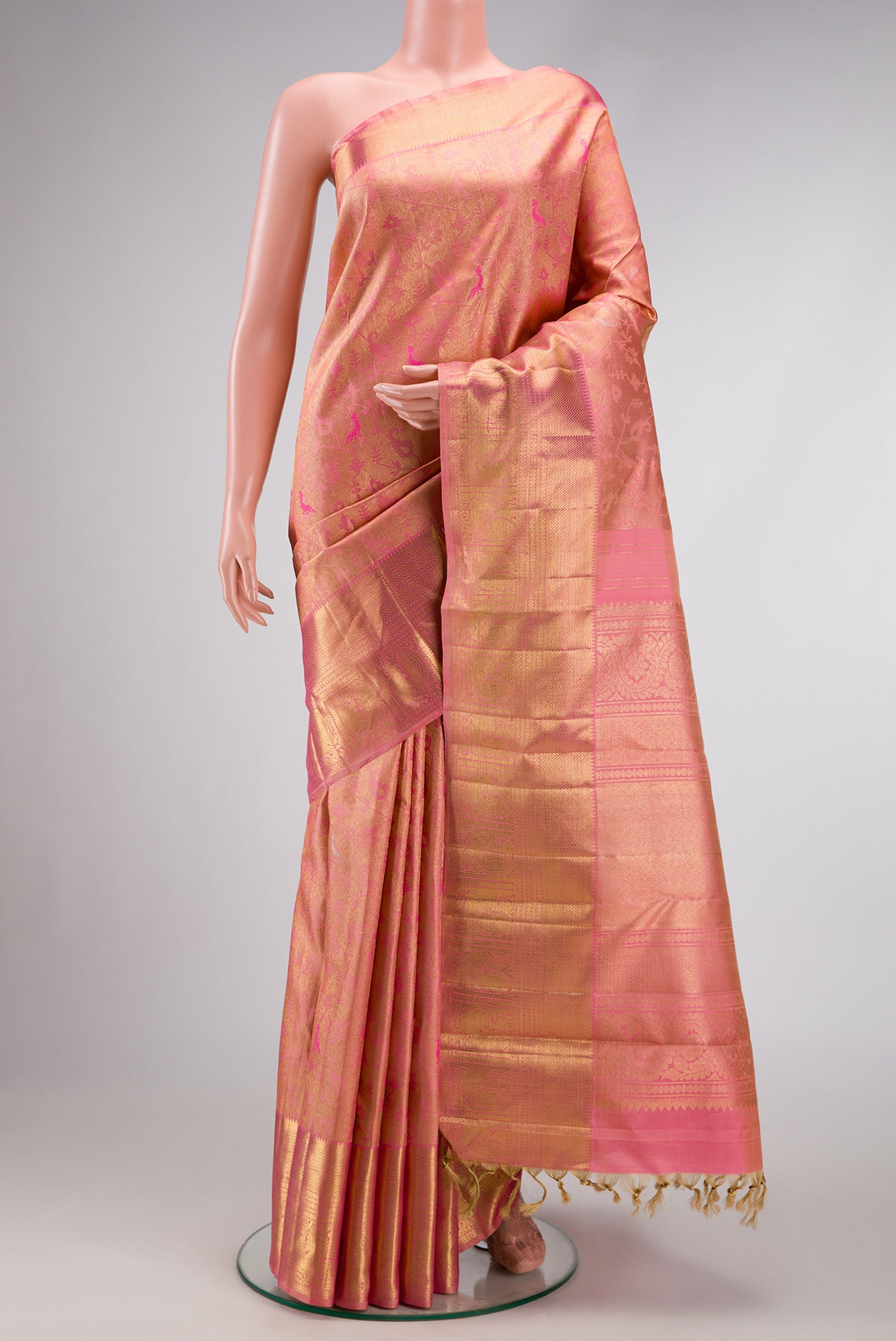 Pure Silk Pure Zari Pink Dual Tone Kanjivaram Saree with Zari Brocade on the body and Zari Border.  displayed on a mannequin