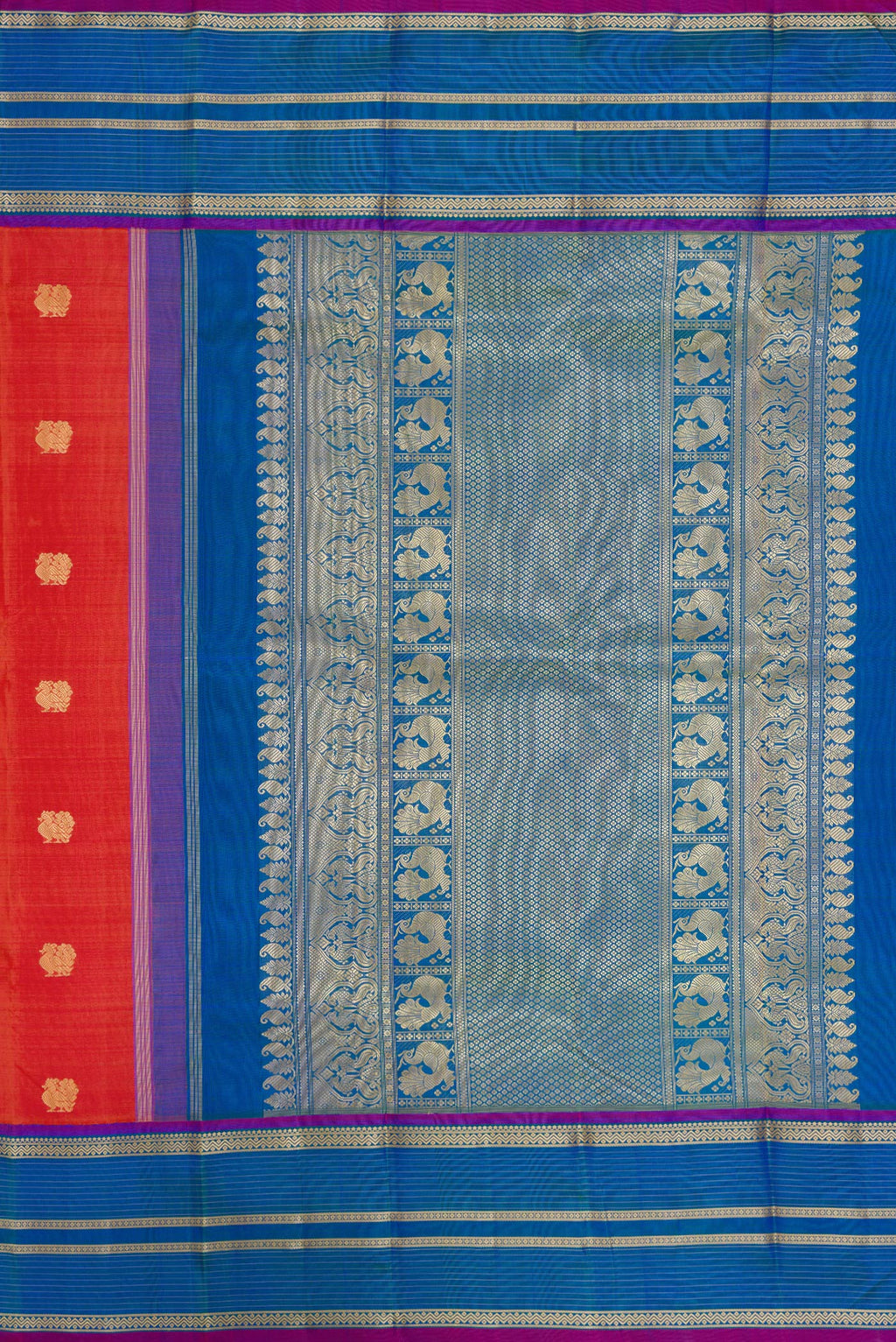 Close up image of the pallu of Orange Dual Tone Kanchipuram Silk Saree with Thread Butta on the body and Thread Border. 