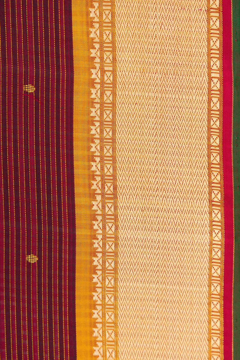 Border image of Pure Silk Pure Zari Maroon Dual Tone Kanchipuram Saree with Zari And Thread Butta on the body and Thread Border. 