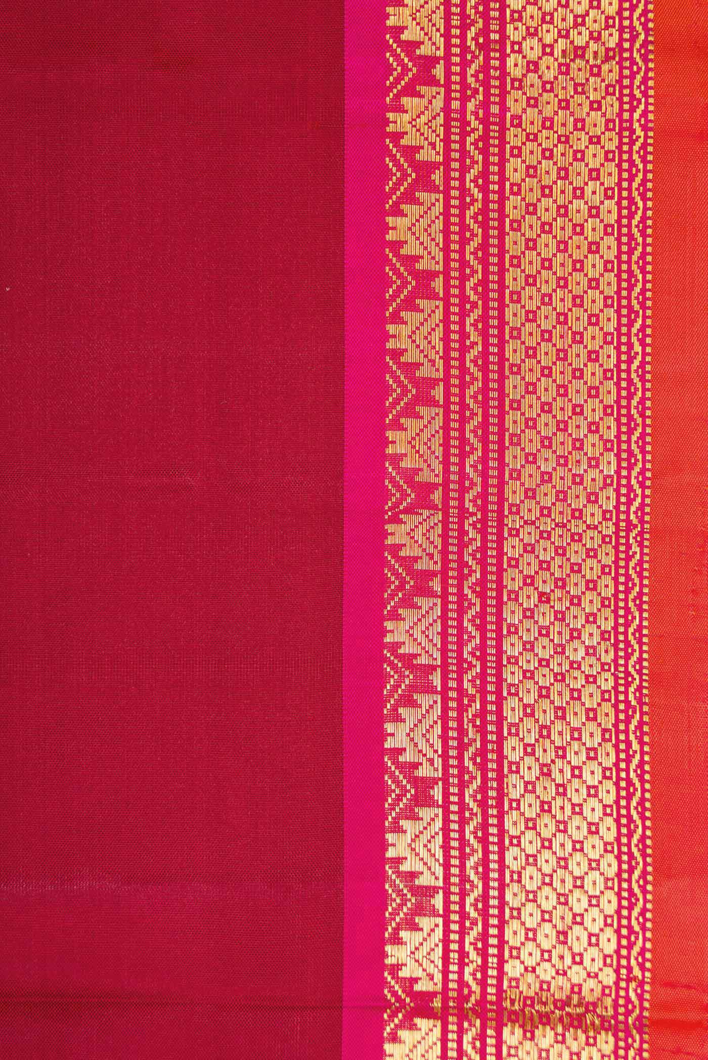 Border image of Maroon Dual Tone Kanjivaram Silk Saree with Plain Body and Zari Border. 