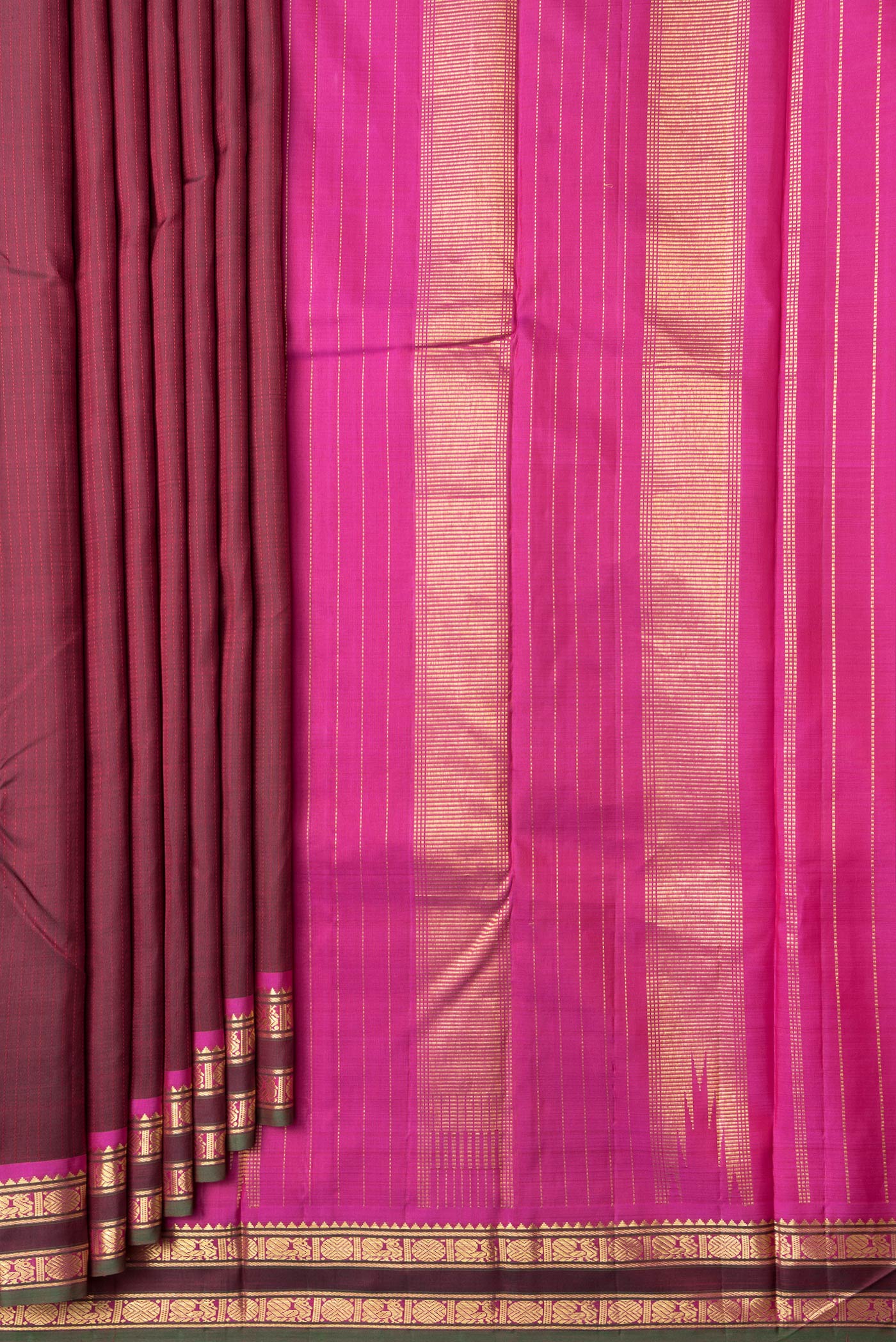 Pleats and pallu of Maroon Dual Tone Kanjivaram Silk Saree with Stripes on the body and Zari Border. 