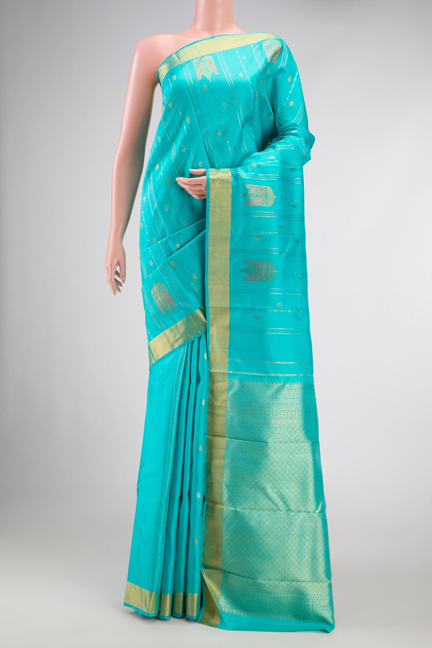Sky Blue Dual Tone Kanchipuram Silk Saree with Stripes on the body and Fancy Border.  displayed on a mannequin