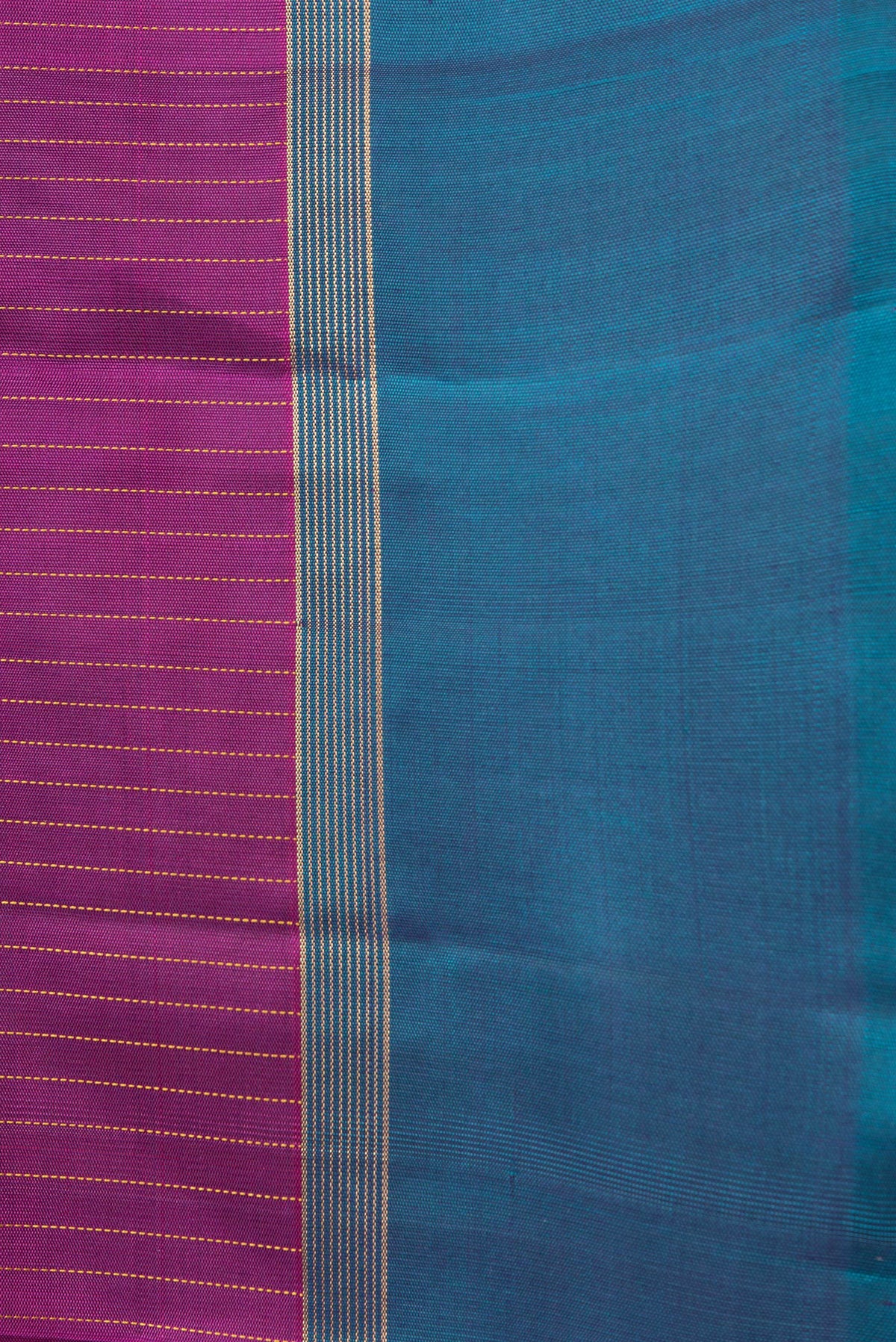Border image of Magenta Dual Tone Kanjivaram Silk Saree with Stripes on the body and Zari Border. 