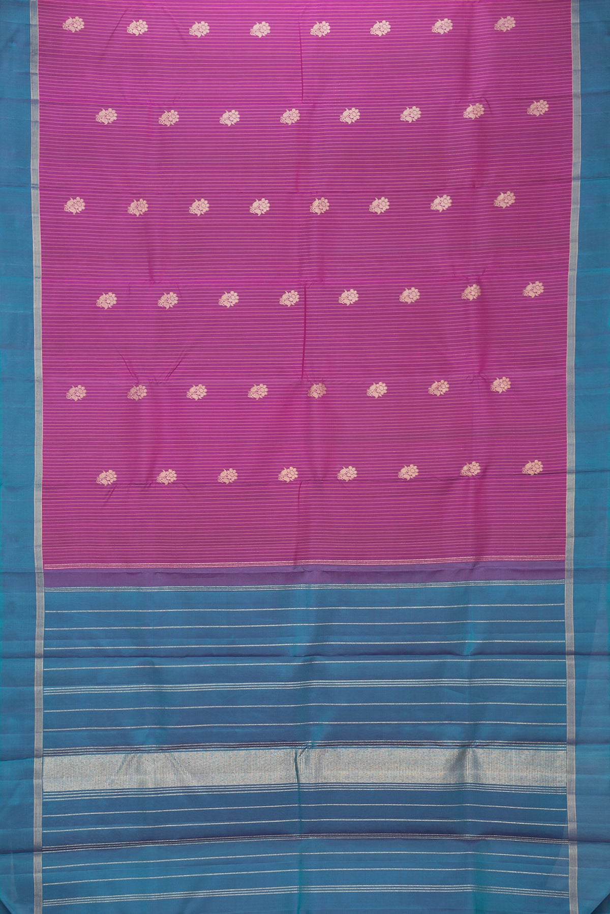 Flat view of Magenta Dual Tone Kanjivaram Silk Saree with Stripes on the body and Zari Border. 