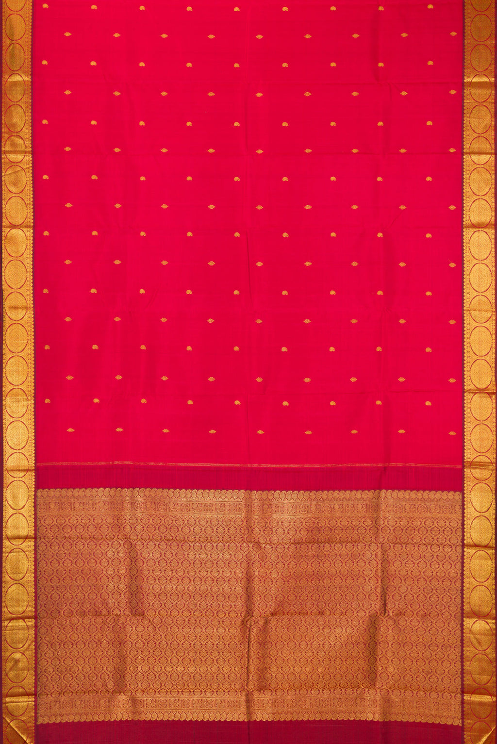 Flat view of Red Kanchipuram Silk Saree with Zari Butta on the body and Zari Border. 
