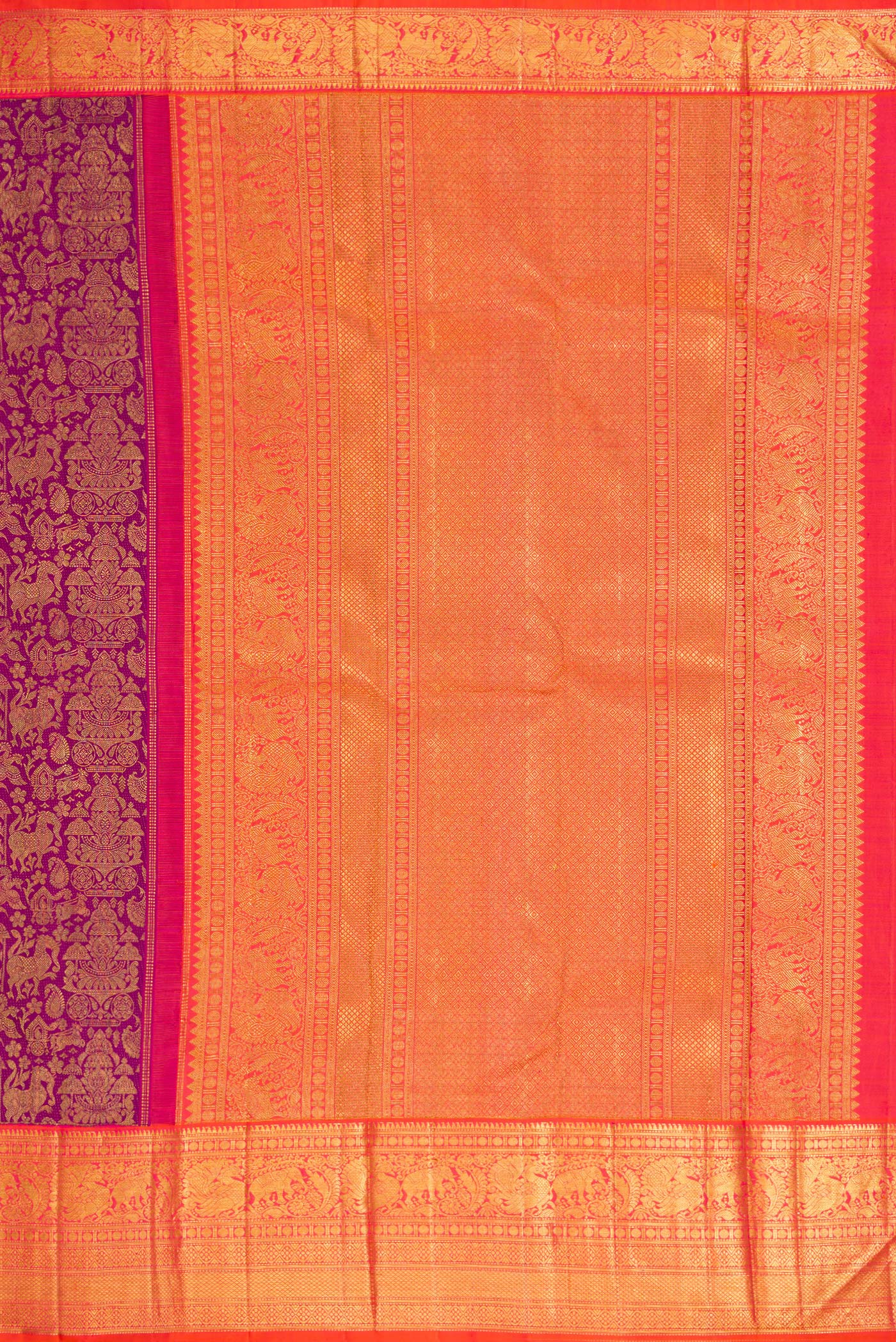 Close up image of the pallu of Magenta Dual Tone Kanchipuram Silk Saree with Zari Brocade on the body and Zari Border. 