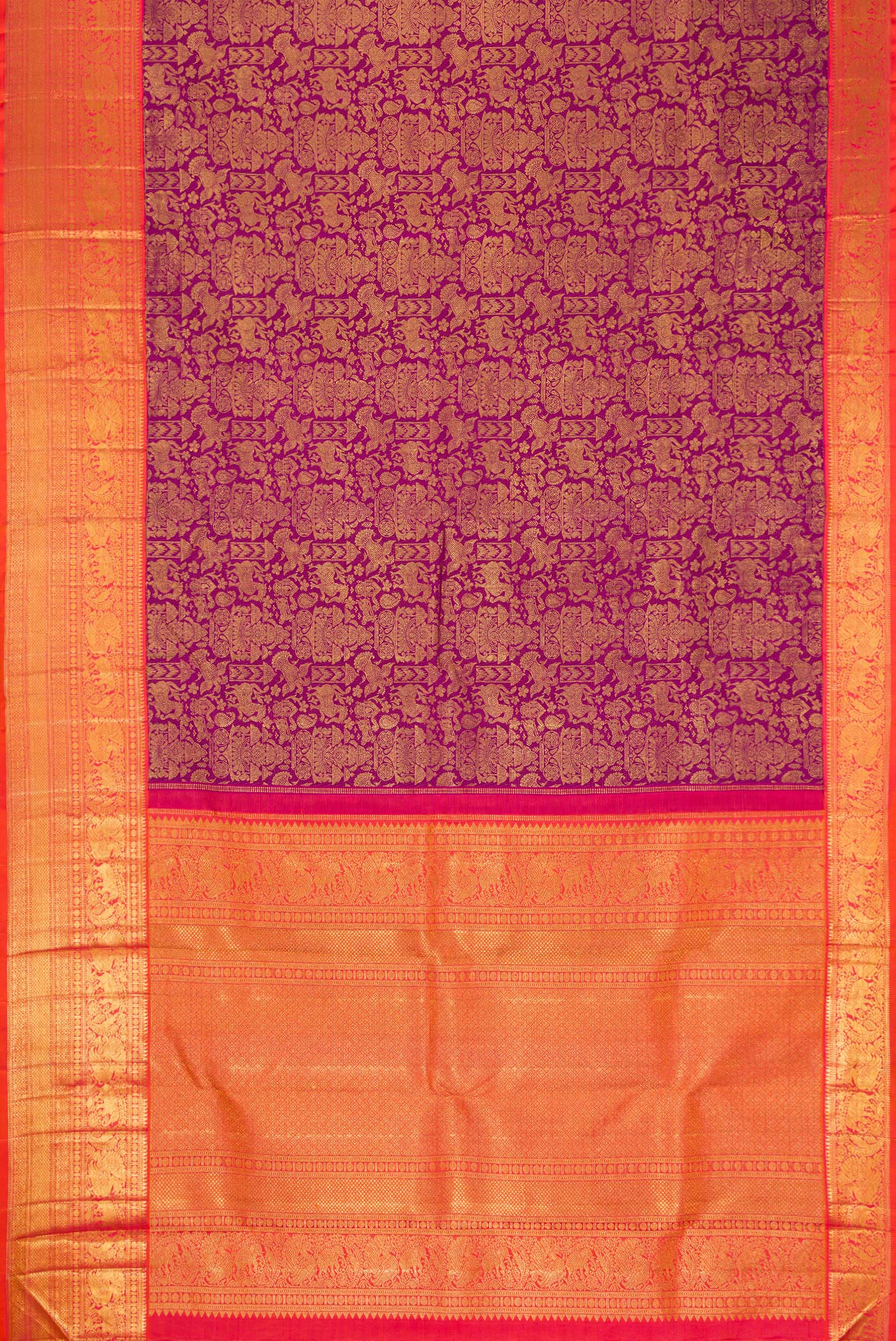 Flat view of Magenta Dual Tone Kanchipuram Silk Saree with Zari Brocade on the body and Zari Border. 