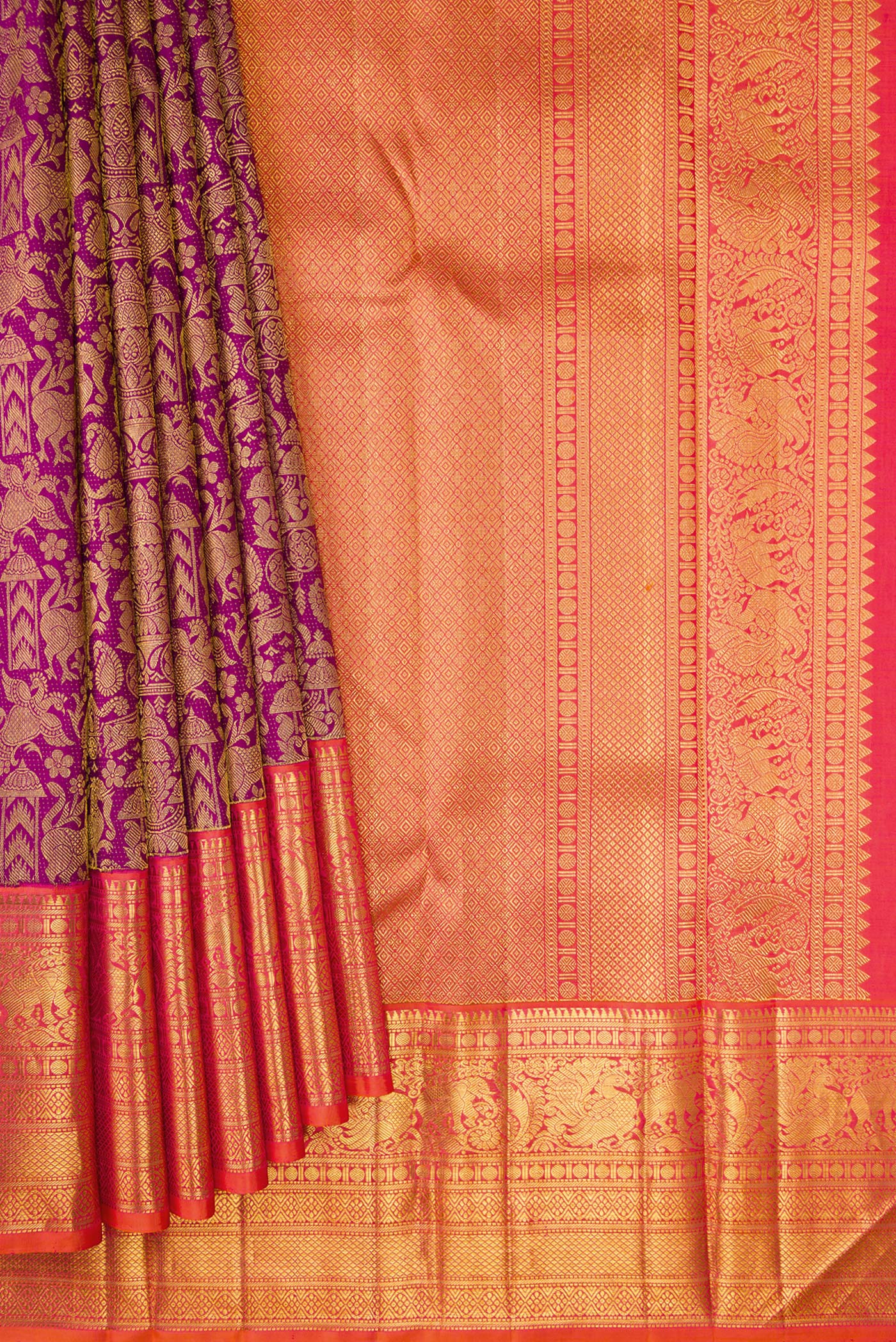 Pleats and pallu of Magenta Dual Tone Kanchipuram Silk Saree with Zari Brocade on the body and Zari Border. 