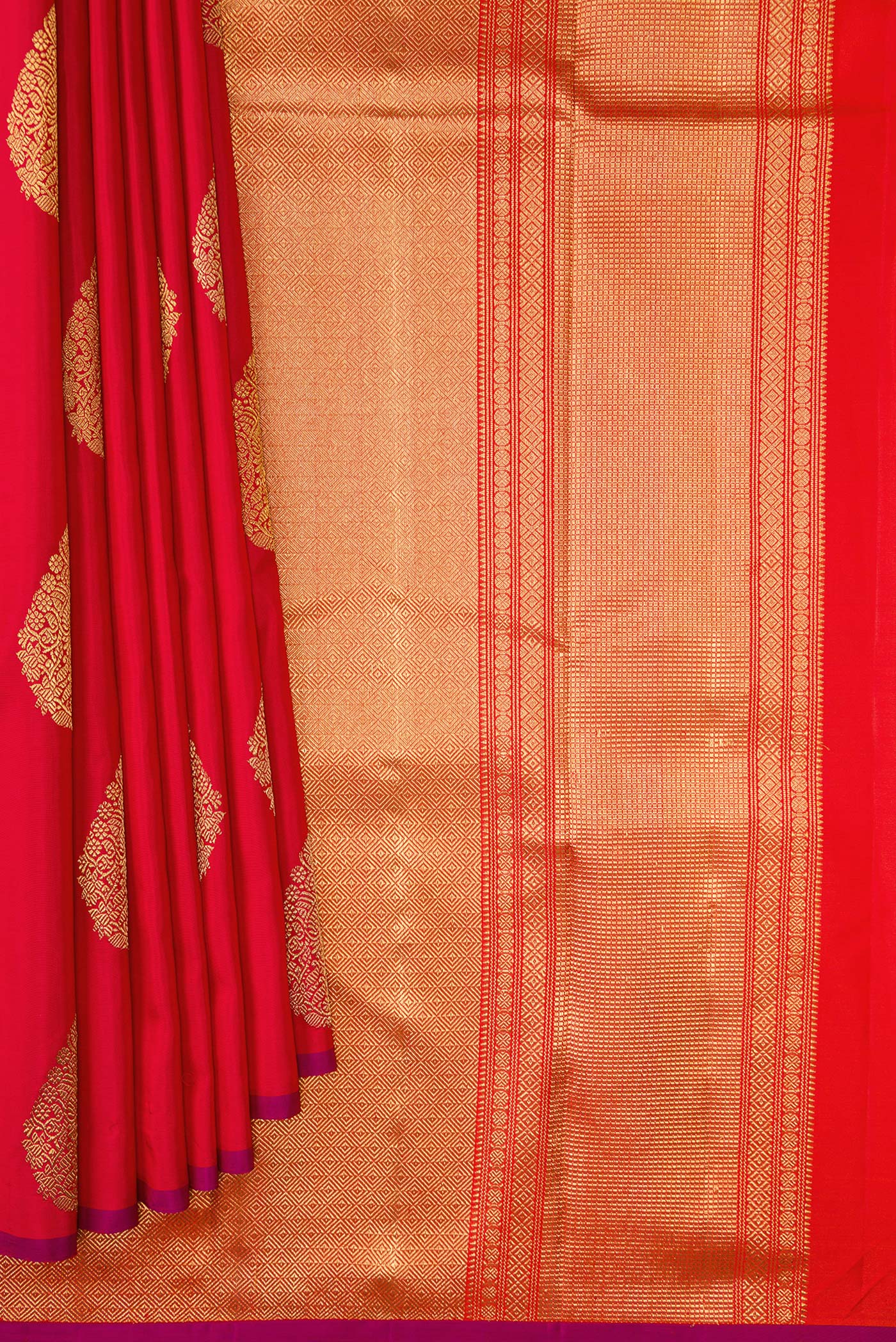 Pleats and pallu of Pure Silk Pure Zari Red Dual Tone Kanchipuram Saree with Zari Butta on the body and Without Border. 