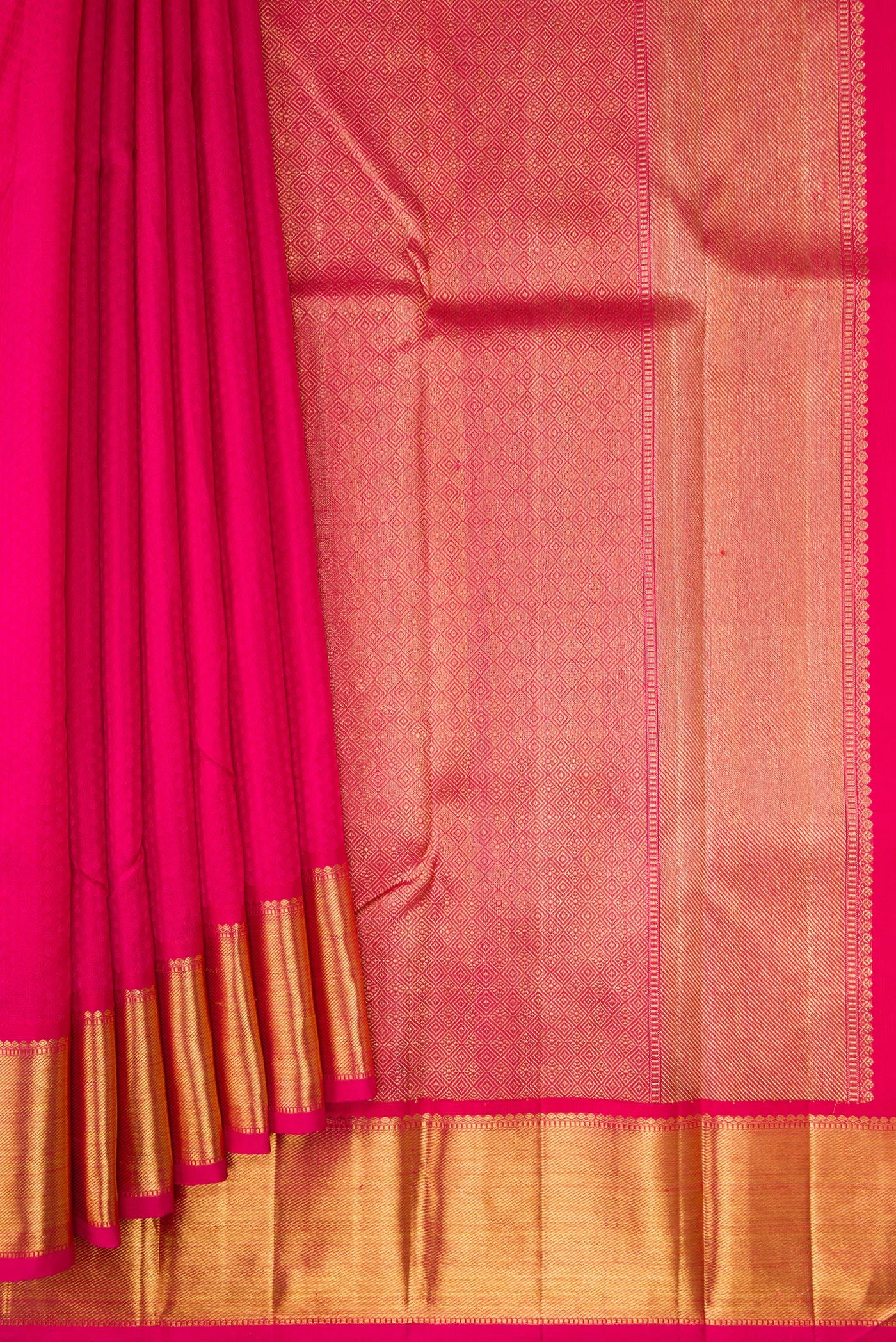 Pleats and pallu of Pure Silk Pure Zari Dark Pink Dual Tone Kanchipuram Saree with Jacquard design on the body and Zari Border. 