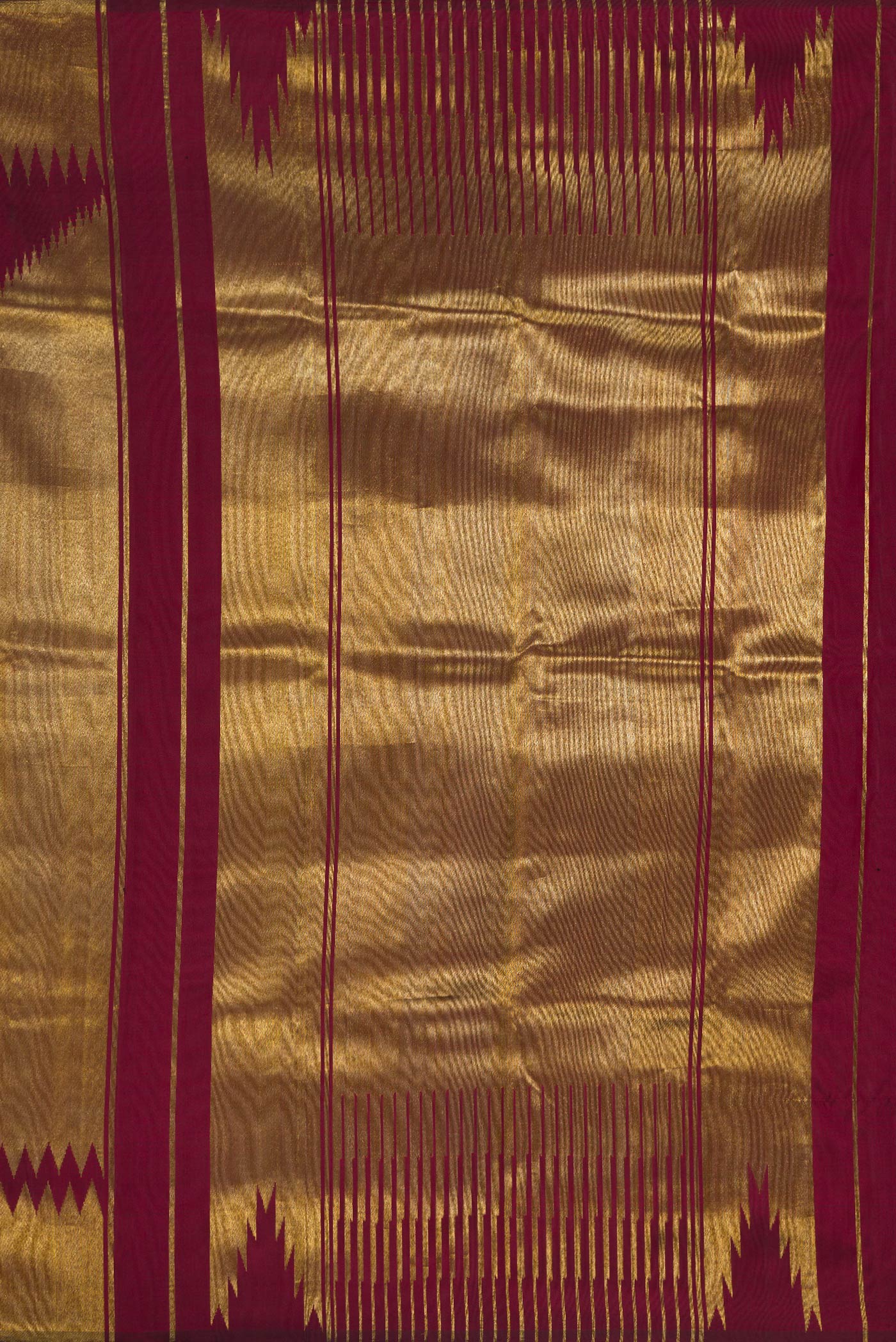 Close up image of the pallu of Pure Silk Pure Zari Maroon Dual Tone Kanchipuram Saree with Plain Body and Rising Temple Border. 