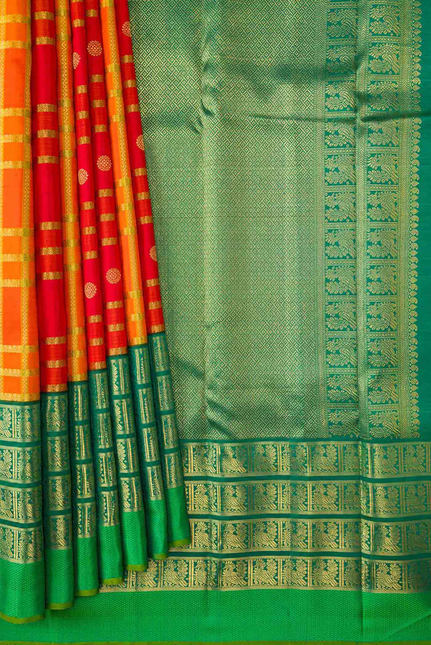Pleats and pallu of Pure Silk Pure Zari Orange Dual Tone Kanchipuram Saree with Checked design on the body and Zari Border