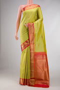 Pure Silk Pure Zari Lemon Yellow Dual Tone Kanchipuram Saree with Zari Butta on the body and Zari Border displayed on a mannequin