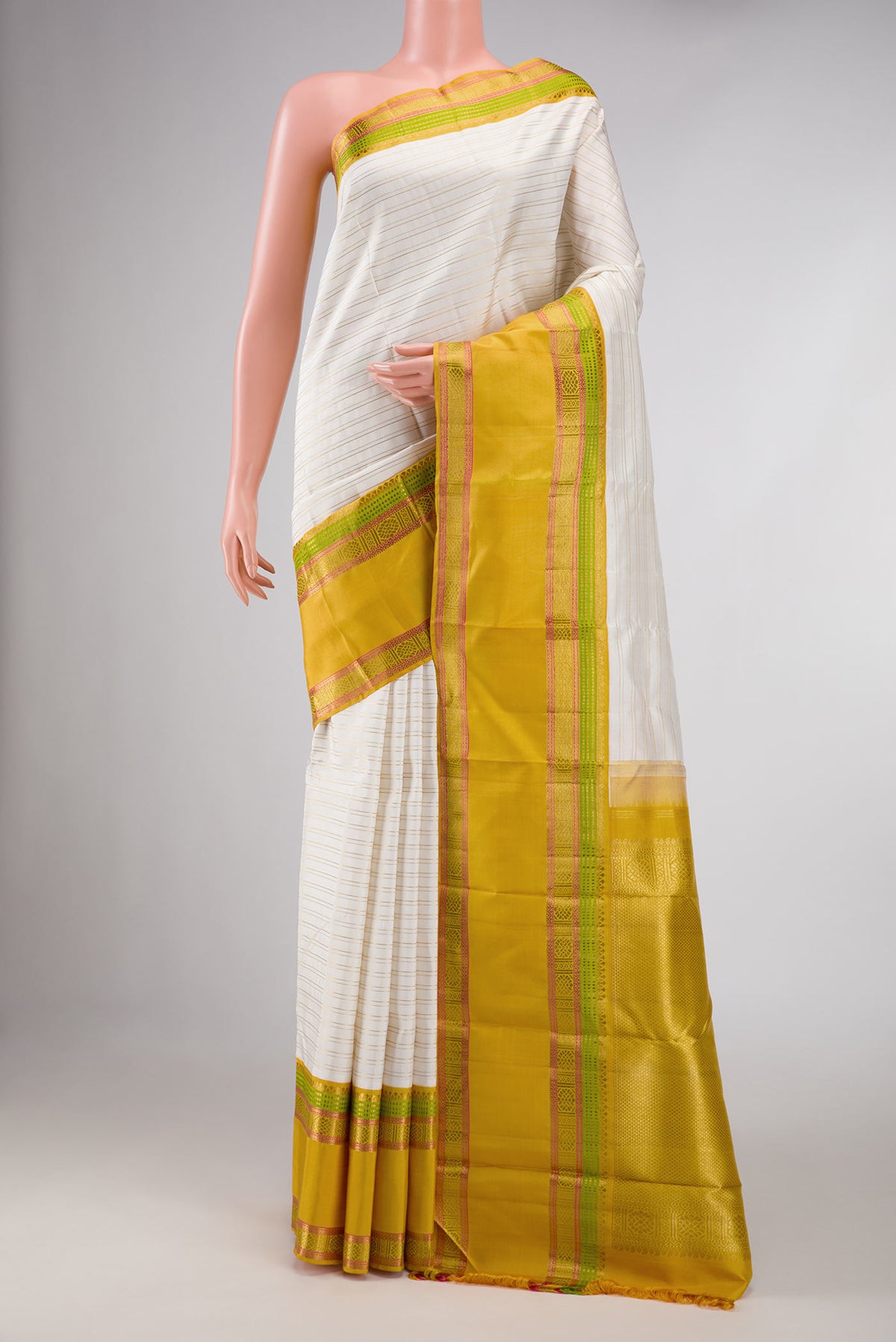 Pure Silk Pure Zari Off White Dual Tone Kanchipuram Saree with Stripes on the body and Zari Border displayed on a mannequin