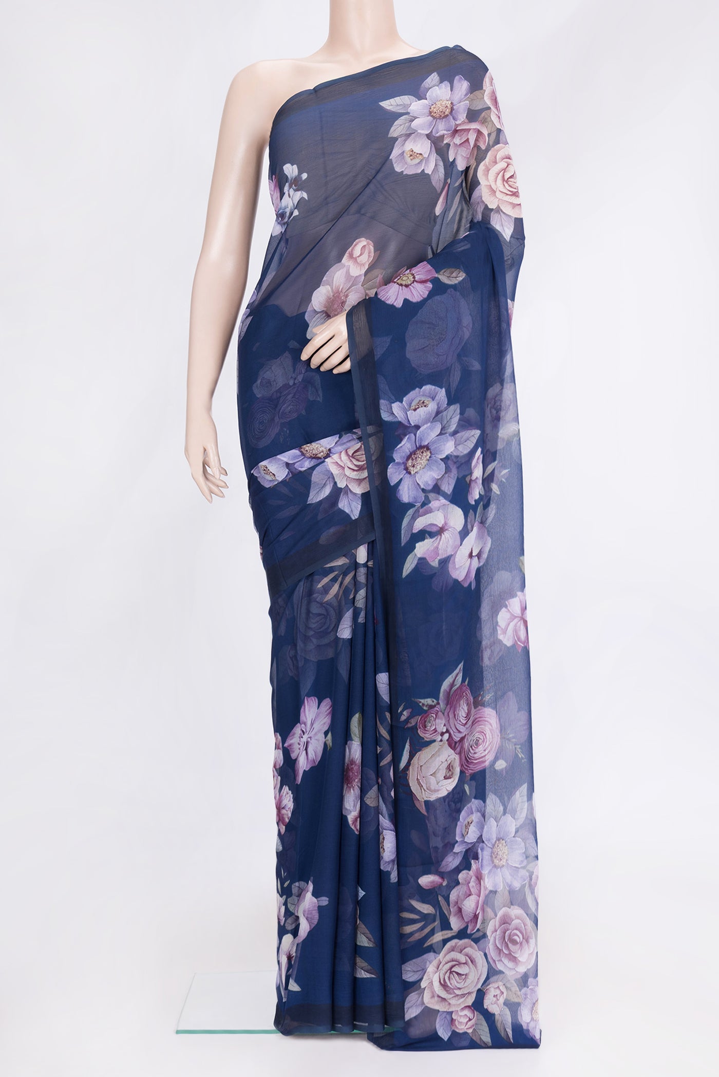 Navy Blue Dual Tone Chiffon Saree with Printed design on the body and Without Border.  displayed on a mannequin