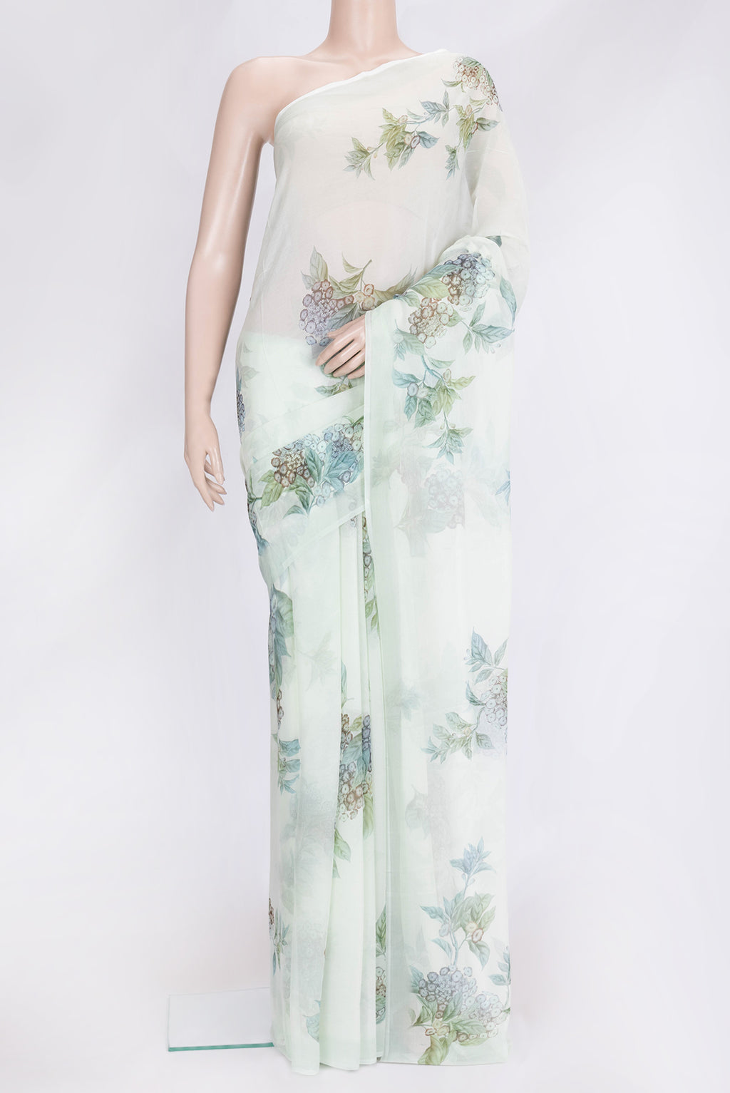 Pista Green Dual Tone Mysore Chiffon Saree with Printed design on the body and Without Border.  displayed on a mannequin