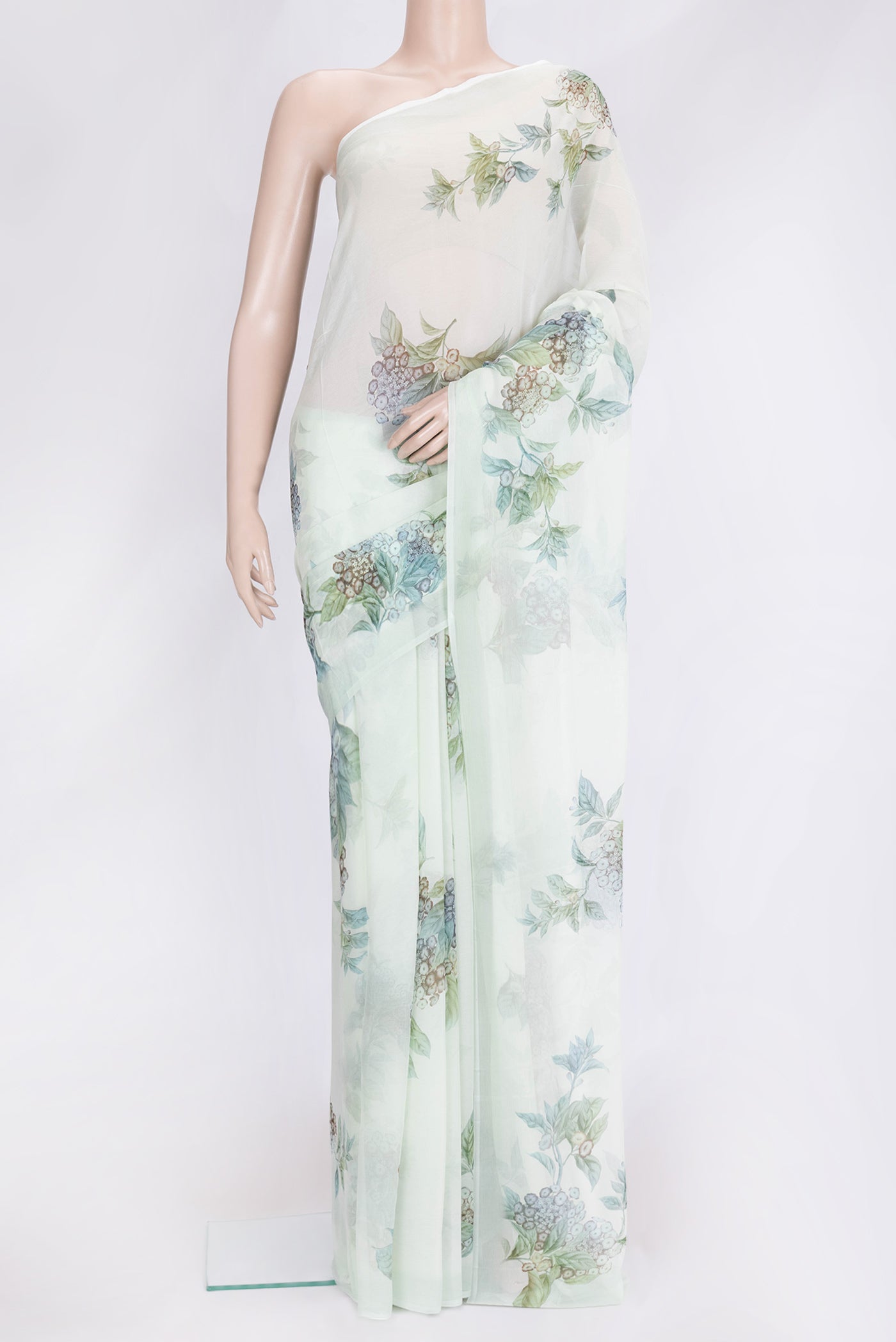 Pista Green Dual Tone Mysore Chiffon Saree with Printed design on the body and Without Border.  displayed on a mannequin