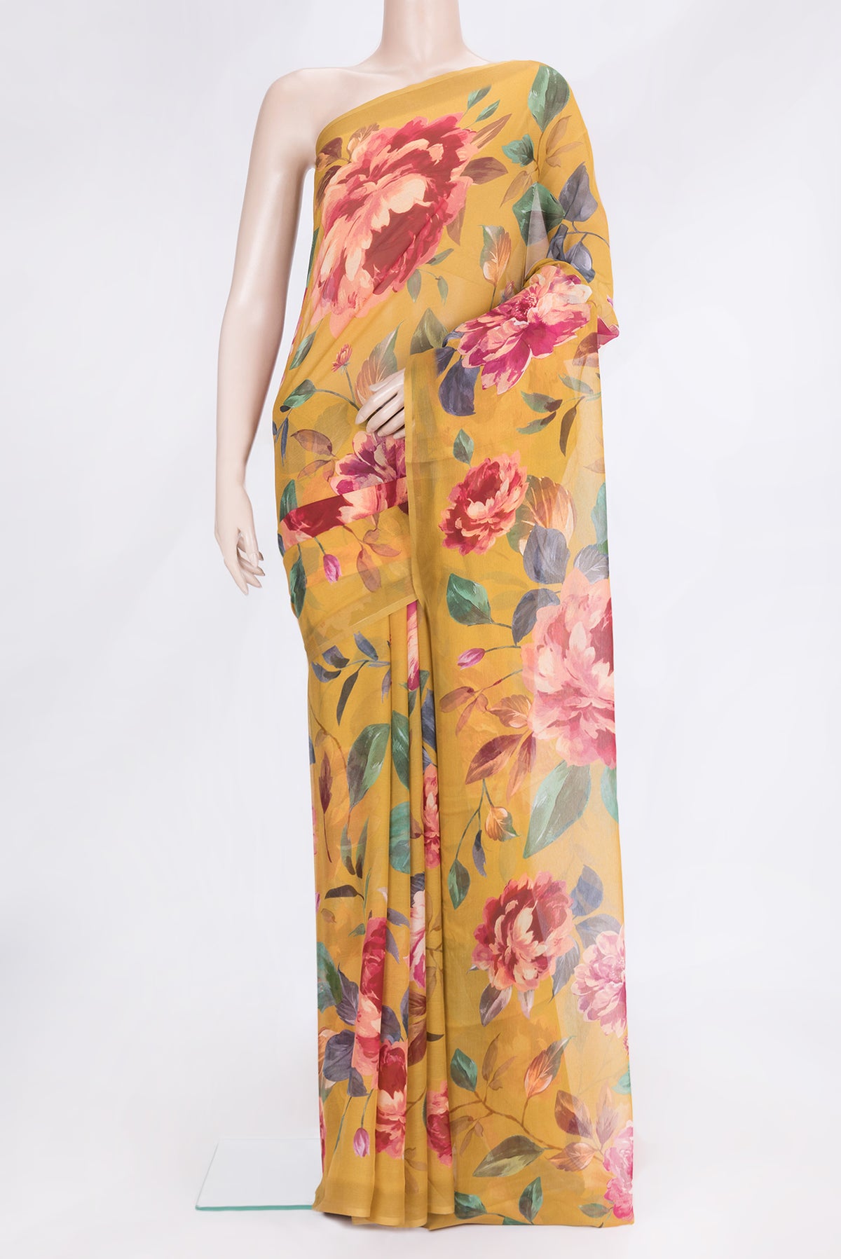Mustard Dual Tone Chiffon Saree with Printed design on the body and Without Border.  displayed on a mannequin