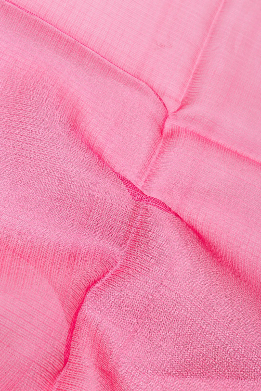 Close up of Pink Kota Silk Saree with Checked design on the body and Thin Zari Line.  displaying folds