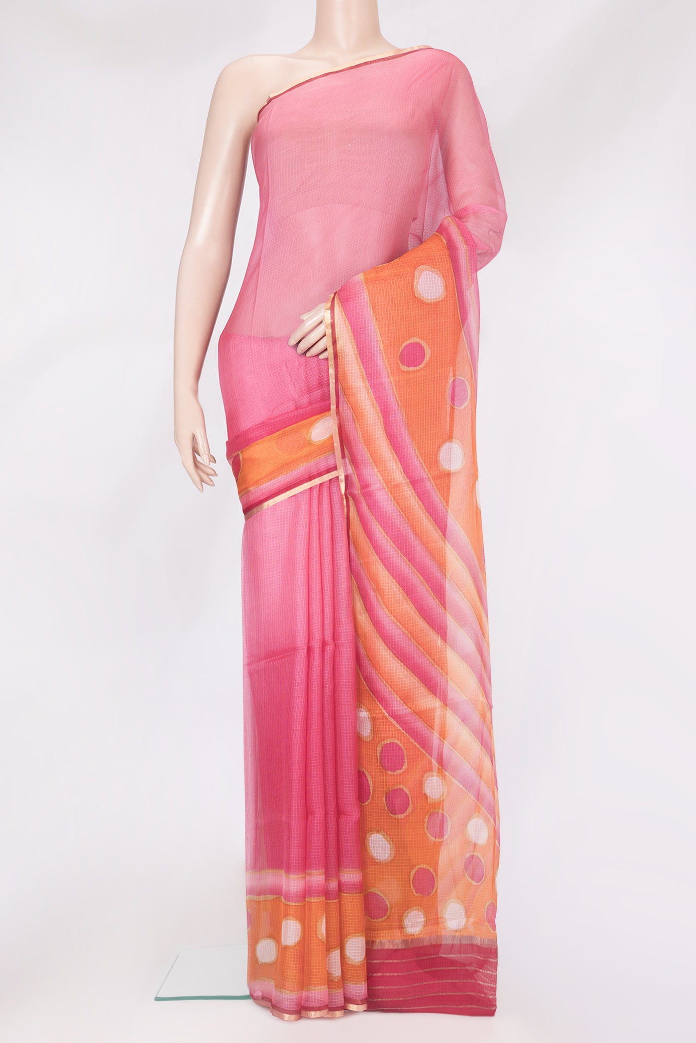 Pink Kota Silk Saree with Checked design on the body and Thin Zari Line.  displayed on a mannequin