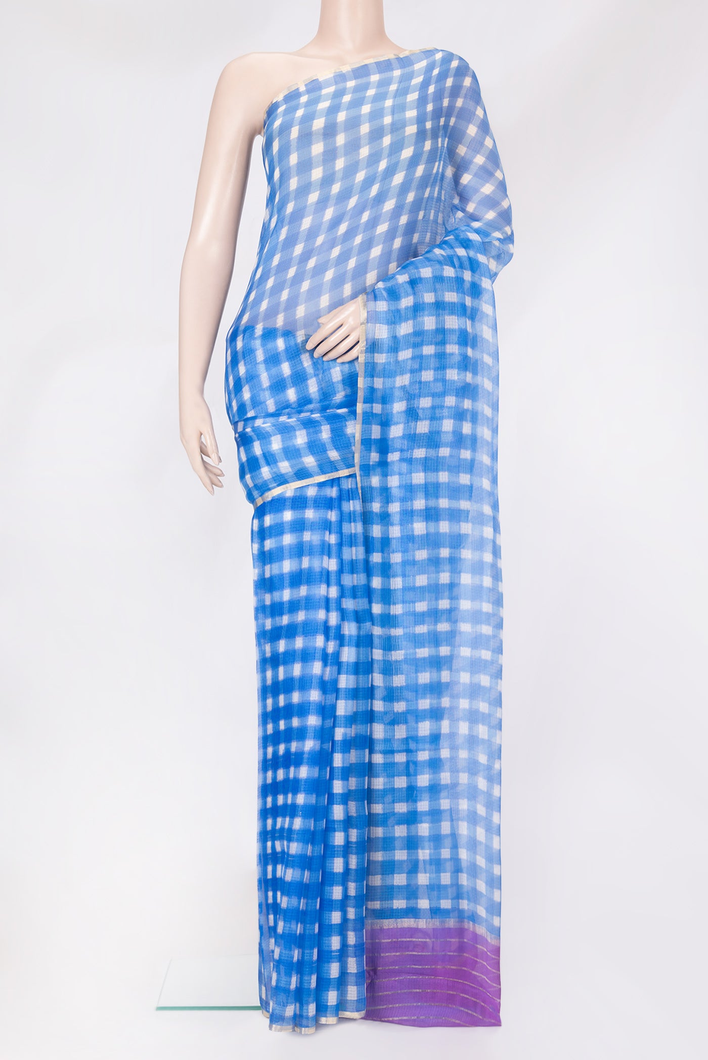 Sky Blue Kota Silk Saree with Checked design on the body and Thin Zari Line.  displayed on a mannequin
