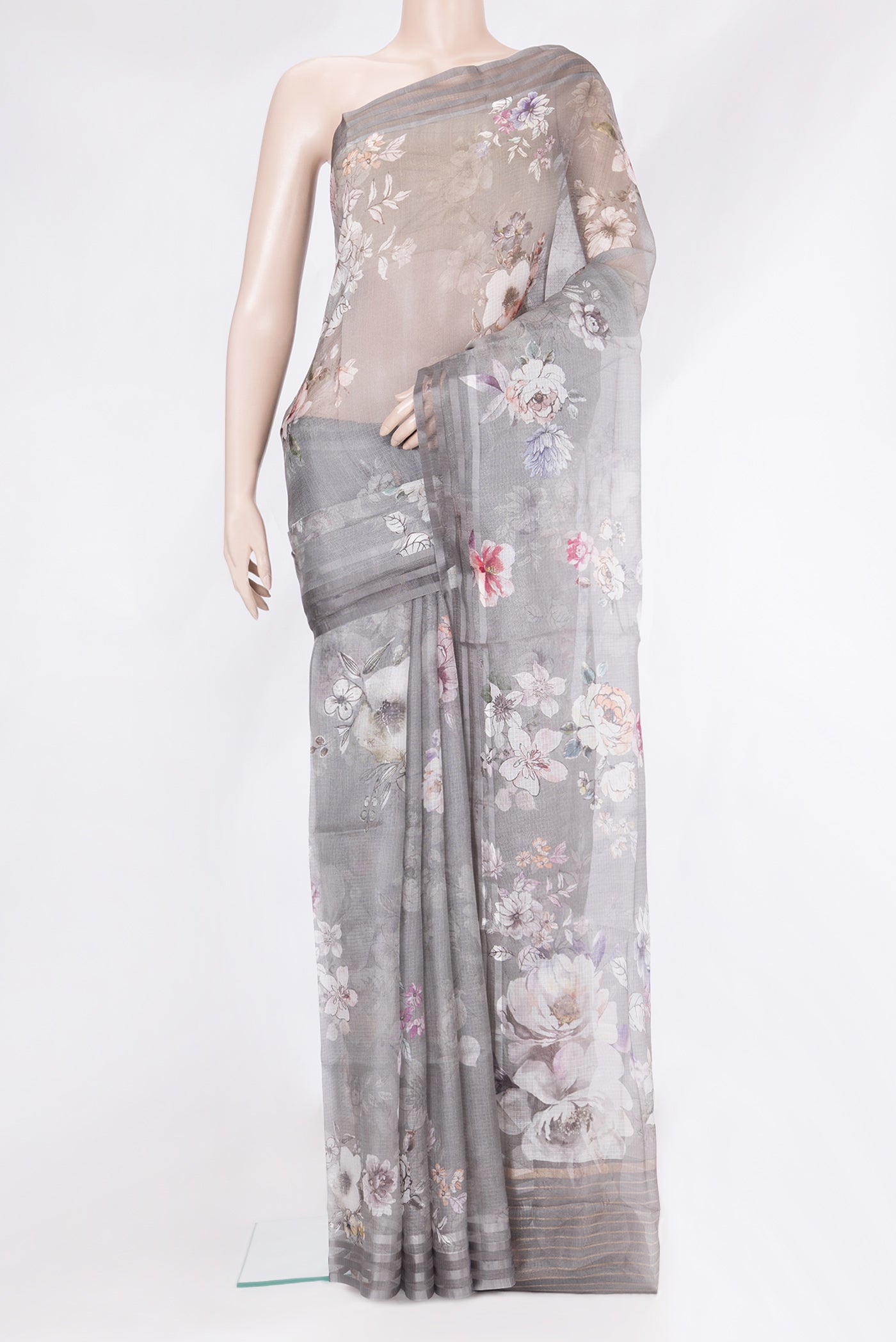 Grey Kota Silk Saree with Floral Print on the body and Plain Border.  displayed on a mannequin