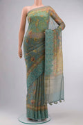 Green Organza Silk Saree Printed design on the body and Embroidery Border displayed on a mannequin