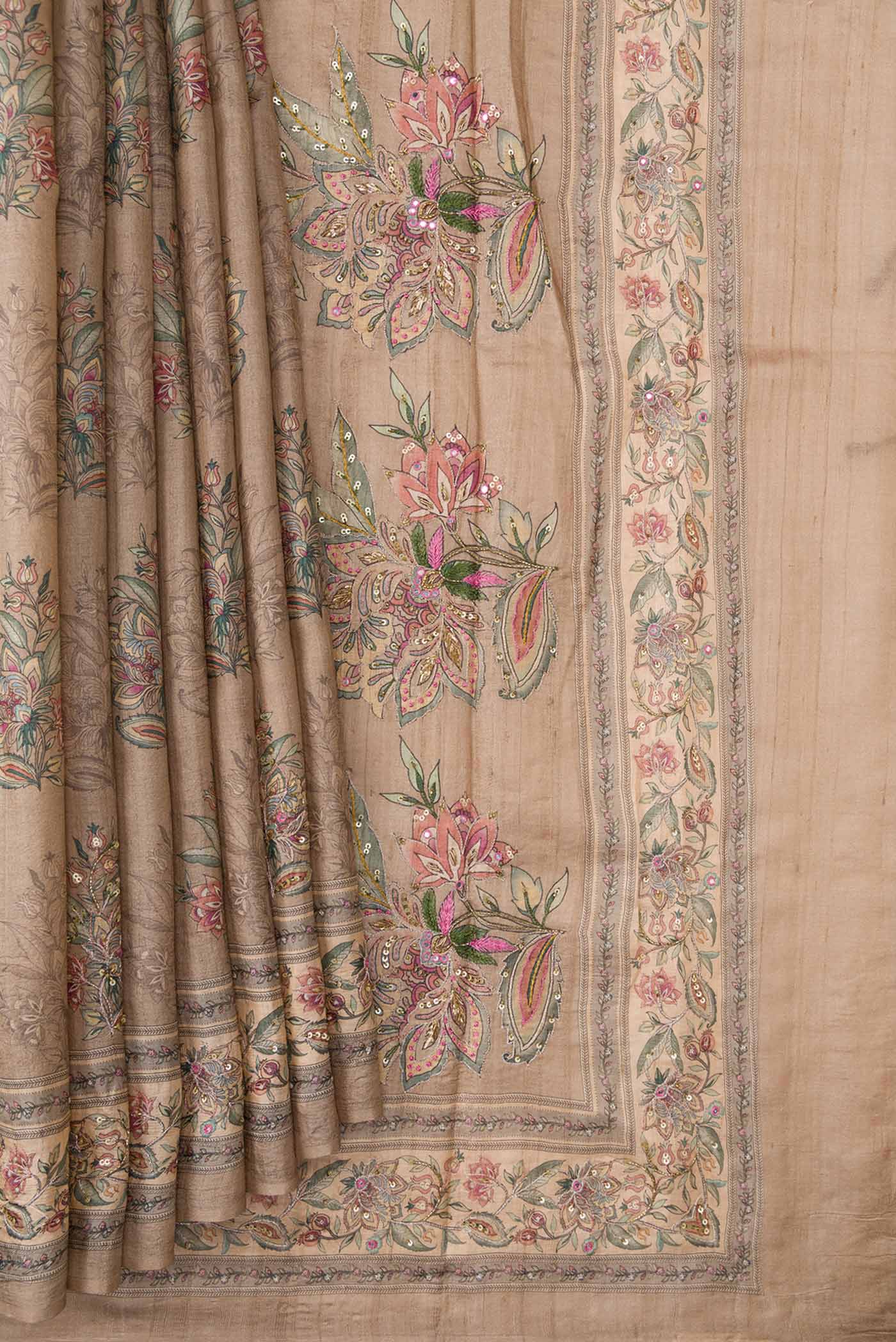 Pleats and pallu of Dark Beige Dual Tone Tussar Silk Saree with Printed design on the body and Printed Border