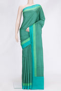 Peacock Blue Dual Tone Printed Silk Saree with Printed design on the body and Printed Border.  displayed on a mannequin
