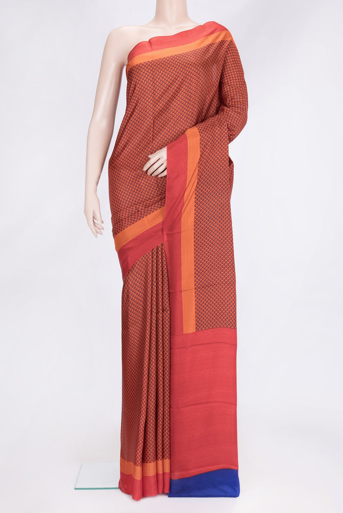 Orange Dual Tone Printed Silk Saree with Printed design on the body and Printed Border.  displayed on a mannequin