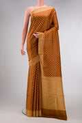 Mustard Dual Tone Printed Silk Saree with Printed design on the body and Printed Border.  displayed on a mannequin