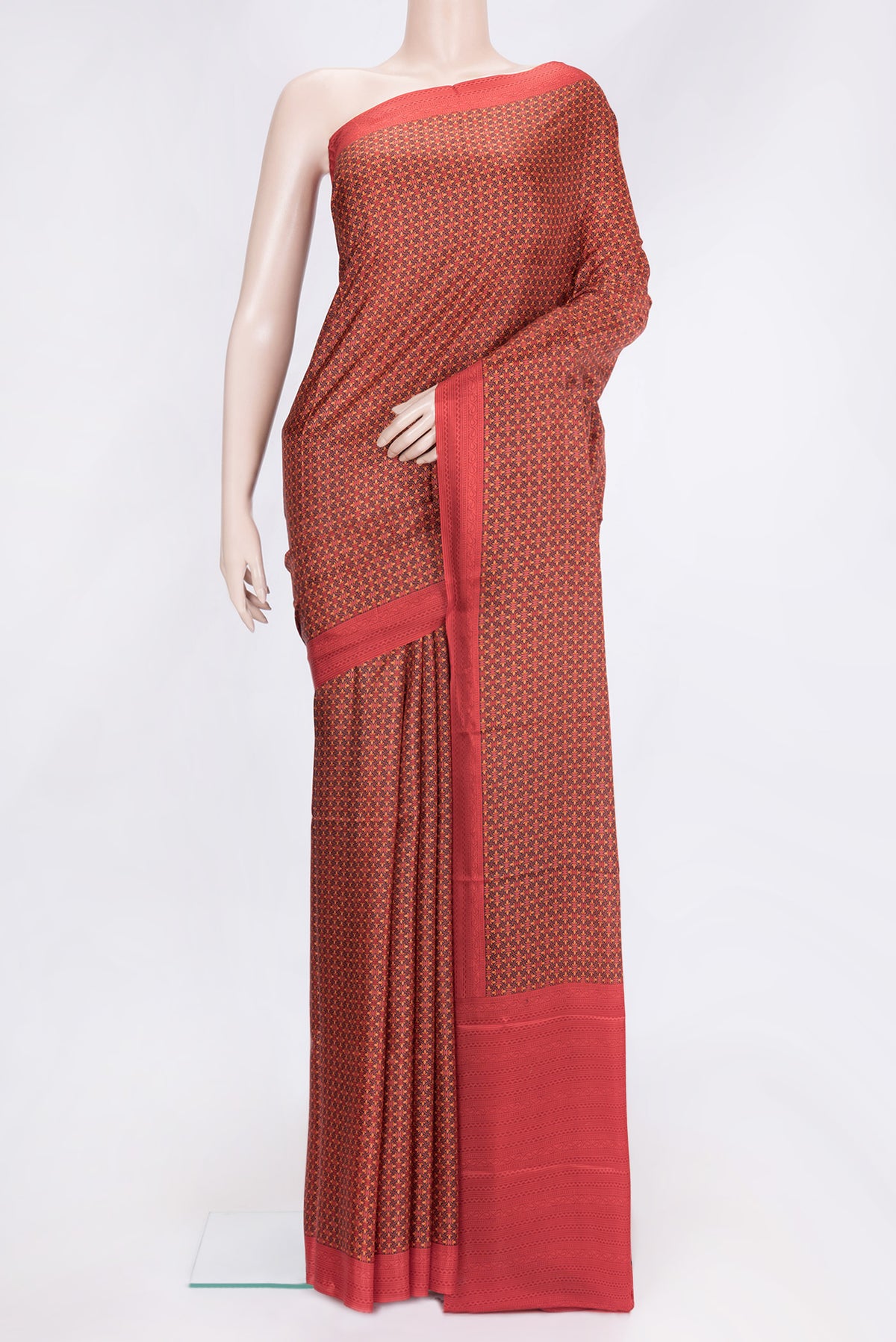 Red Dual Tone Printed Silk Saree with Printed design on the body and Printed Border.  displayed on a mannequin