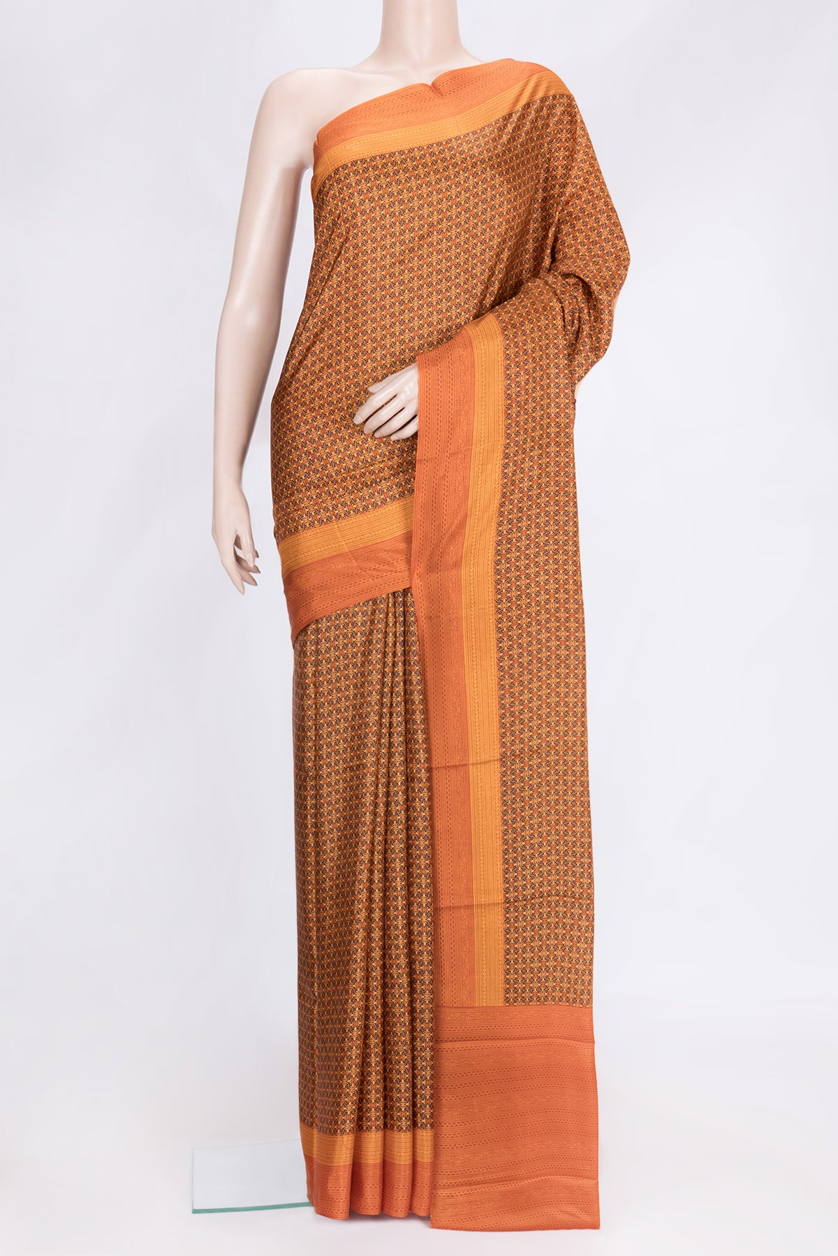 Orange Dual Tone Printed Silk Saree with Printed design on the body and Printed Border.  displayed on a mannequin