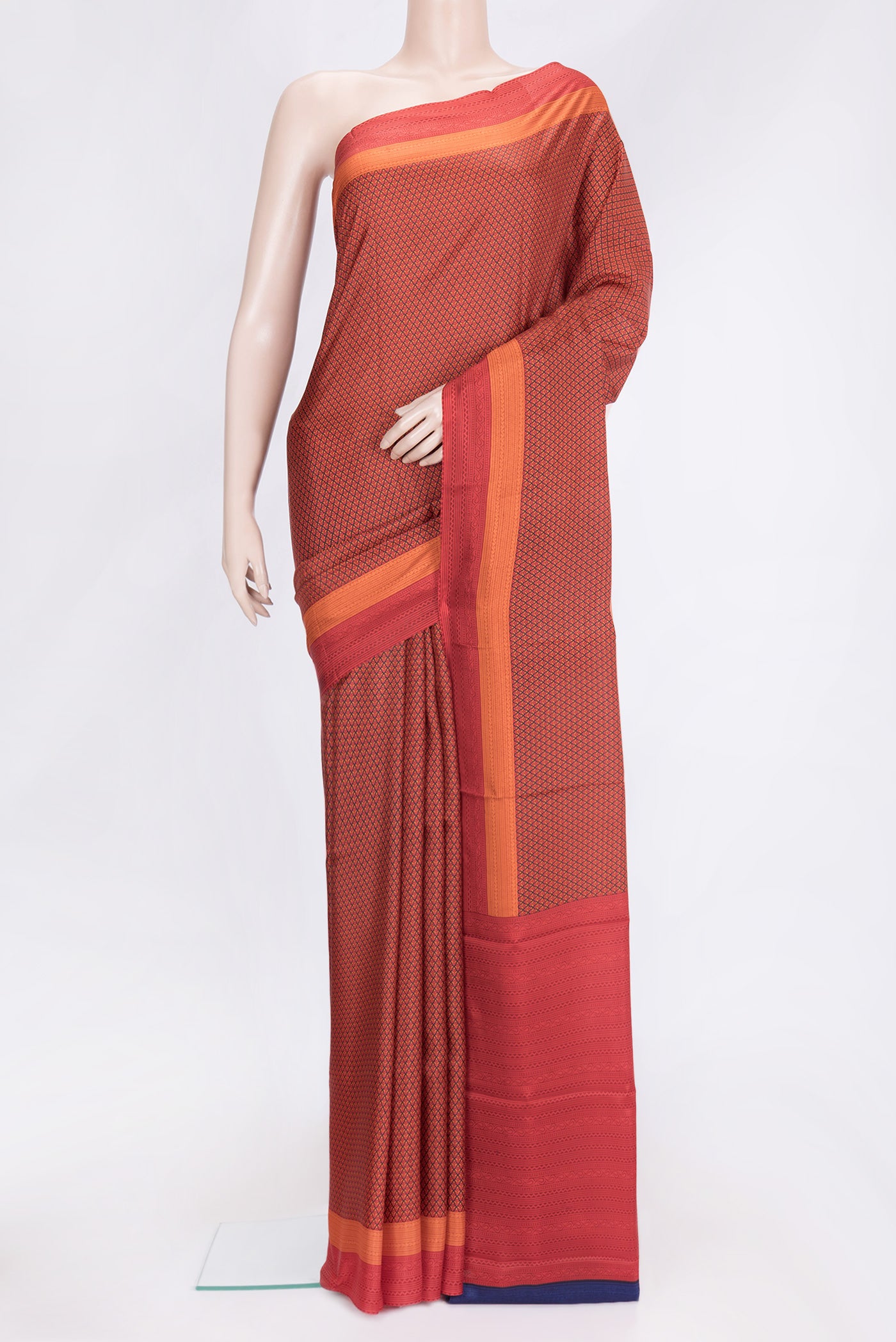 Red Dual Tone Printed Silk Saree with Printed design on the body and Printed Border.  displayed on a mannequin