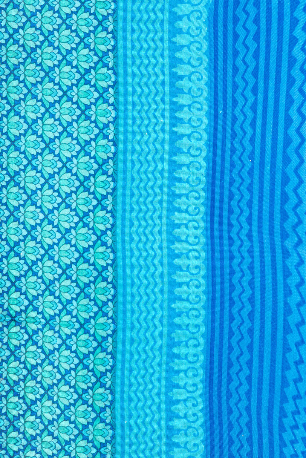 Border image of Peacock Blue Dual Tone Printed Silk Saree with Printed design on the body and Printed Border. 
