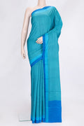 Peacock Blue Dual Tone Printed Silk Saree with Printed design on the body and Printed Border.  displayed on a mannequin